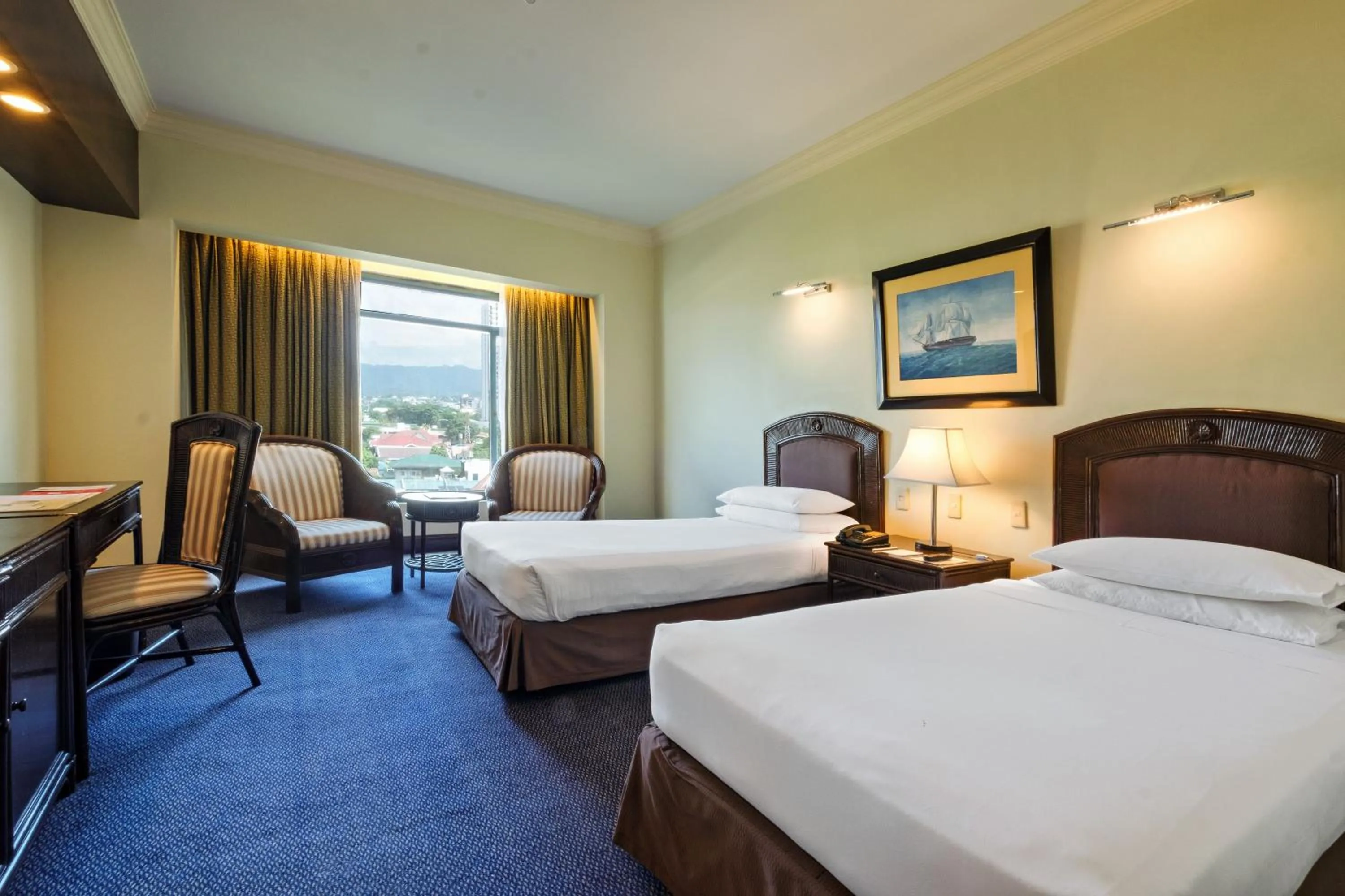 Bed in Waterfront Cebu City Hotel & Casino