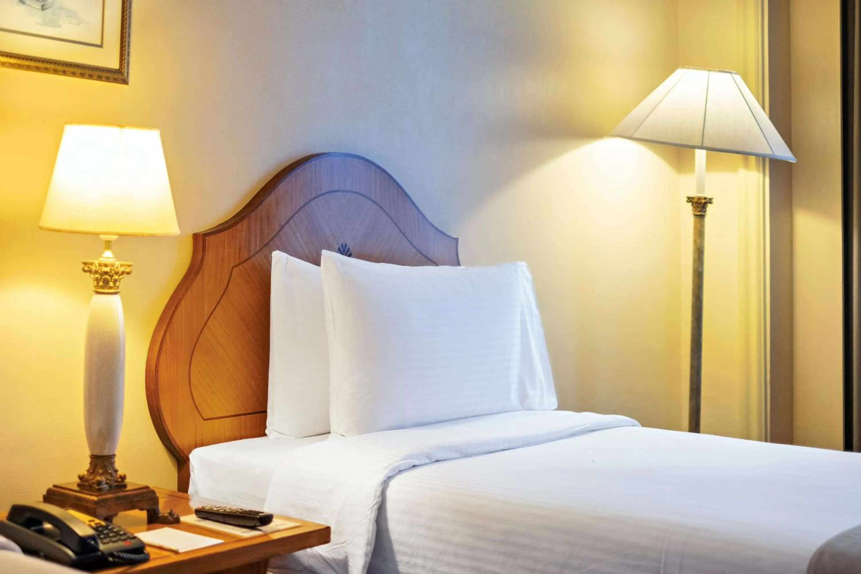 Bed in Waterfront Cebu City Hotel & Casino