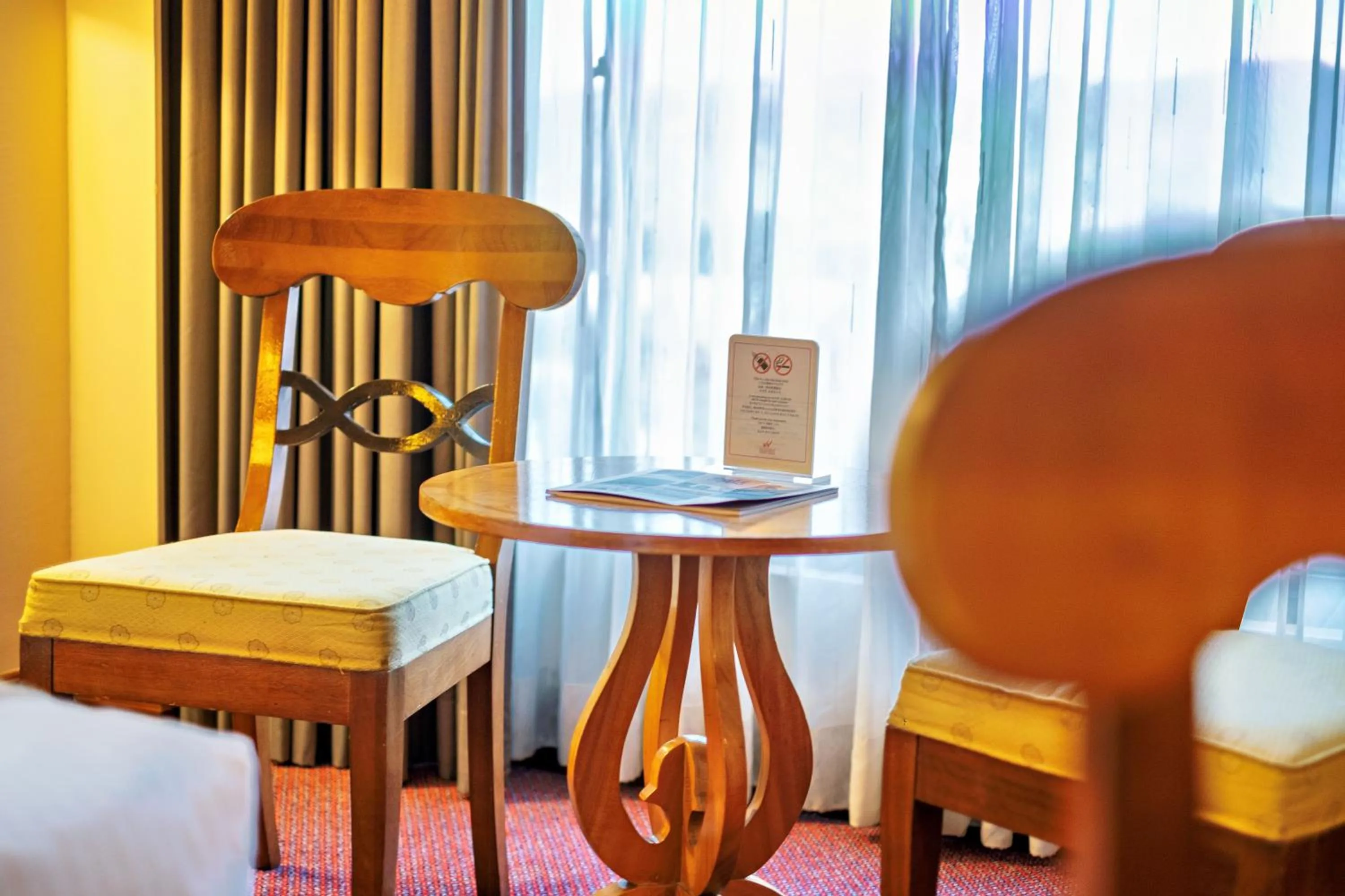 Seating area, Bed in Waterfront Cebu City Hotel & Casino