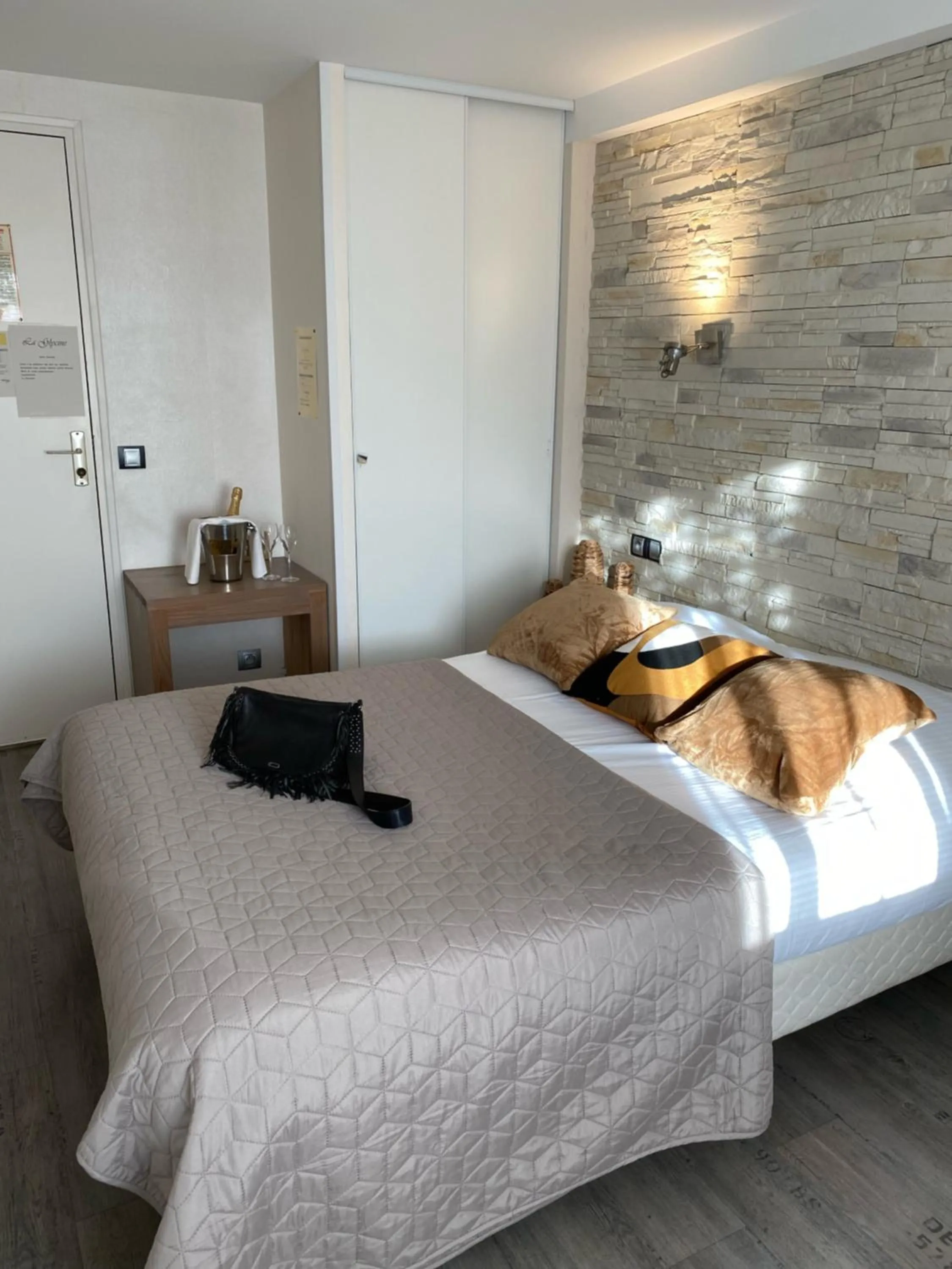 Bed in La glycine hotel, spa et bien-être