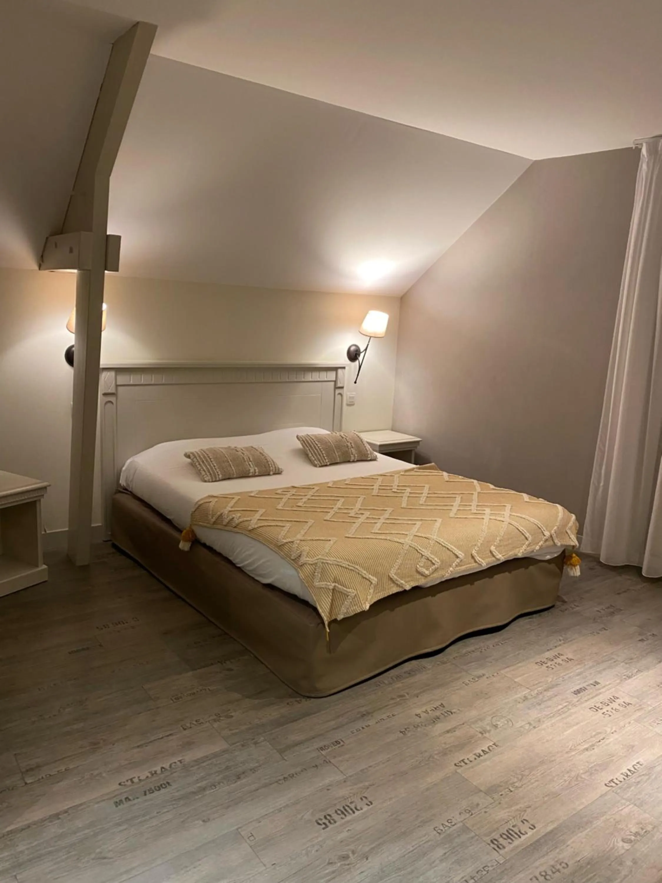 Bed in La glycine hotel, spa et bien-être