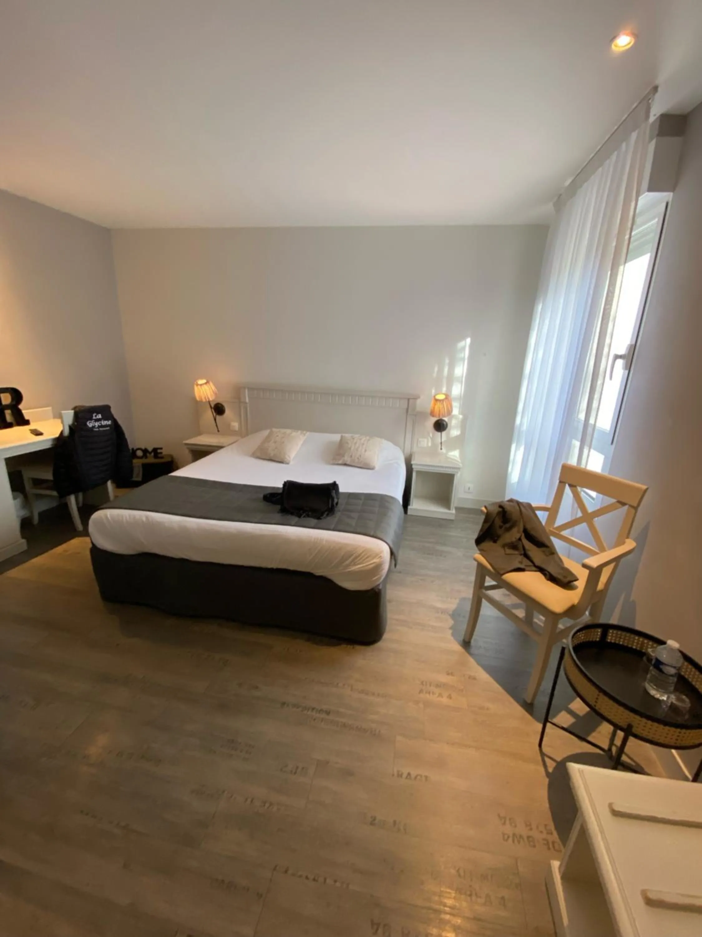 Bed in La glycine hotel, spa et bien-être