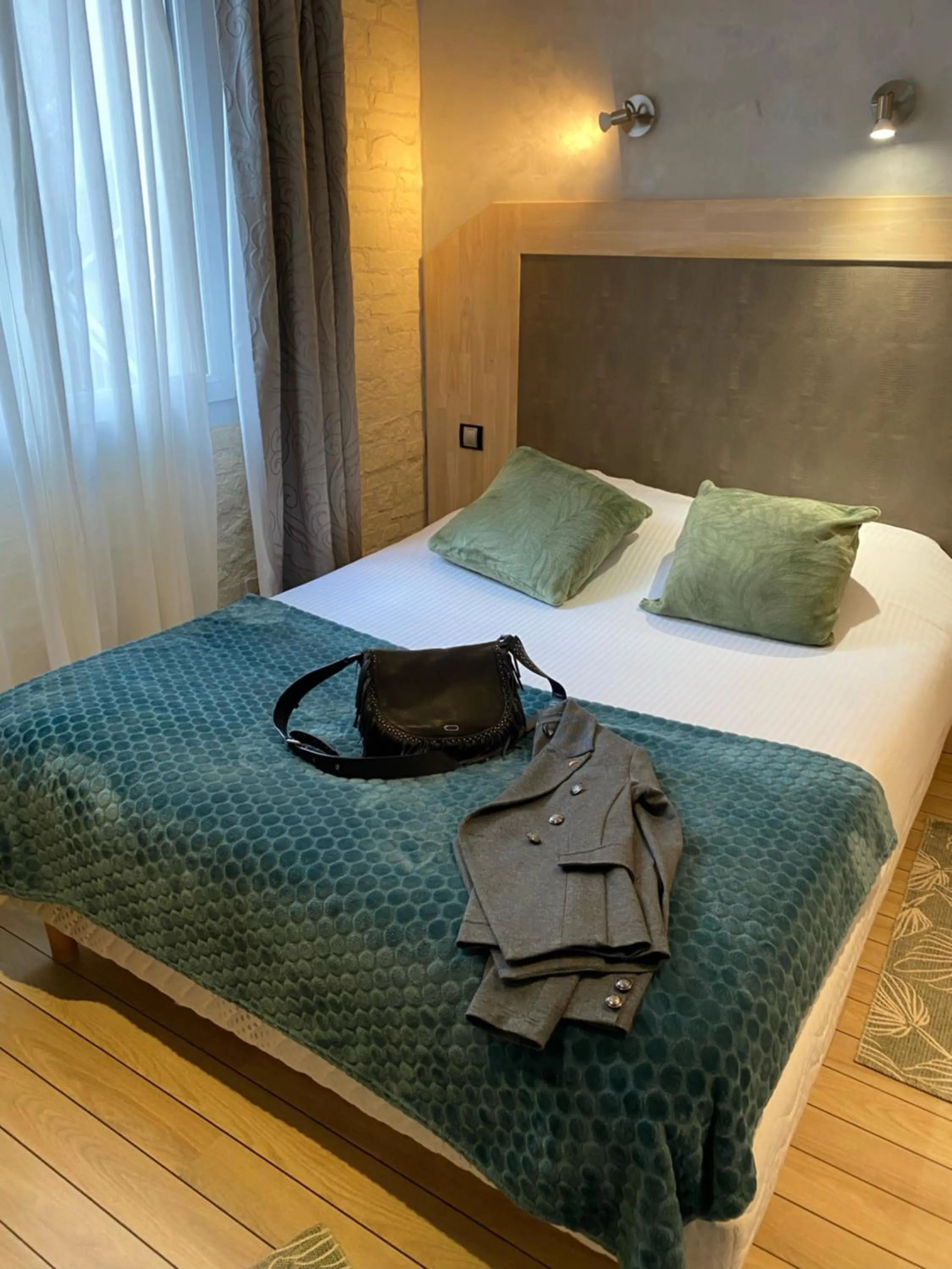 Bed in La glycine hotel, spa et bien-être