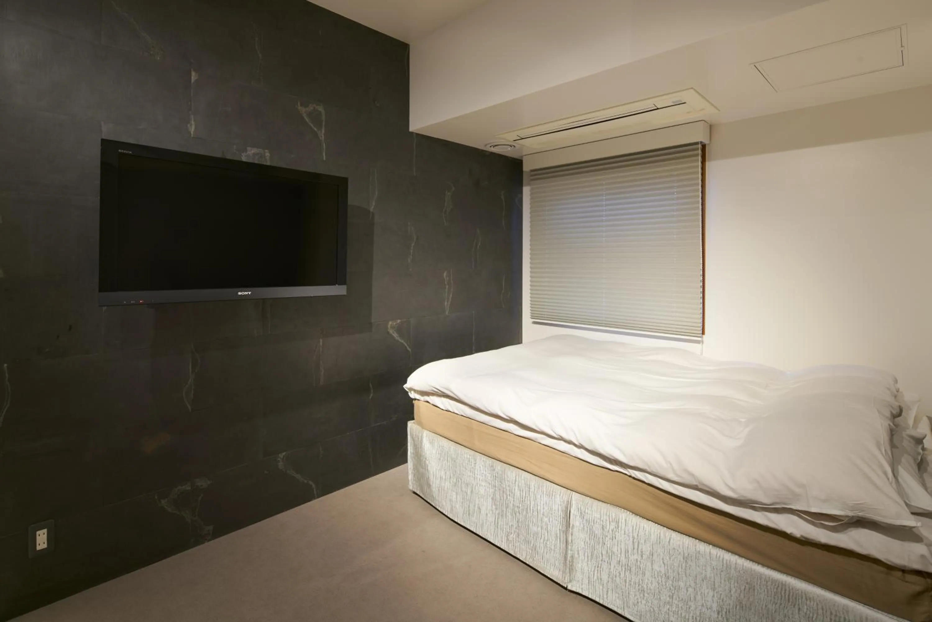 Photo of the whole room, Bed in Shinjuku City Hotel N.U.T.S Tokyo