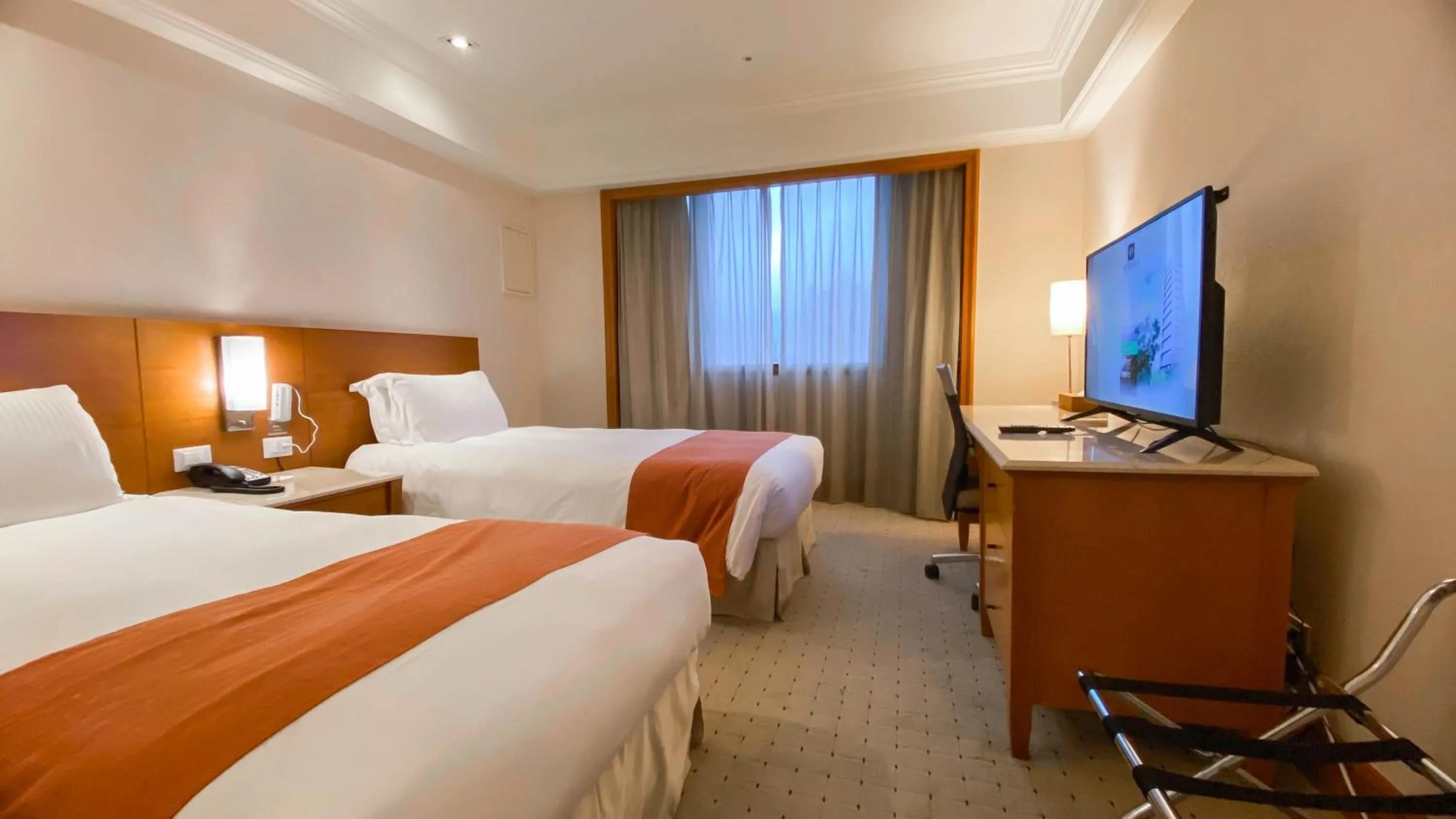 Photo of the whole room, Bed in HiONE Holiday Hotel