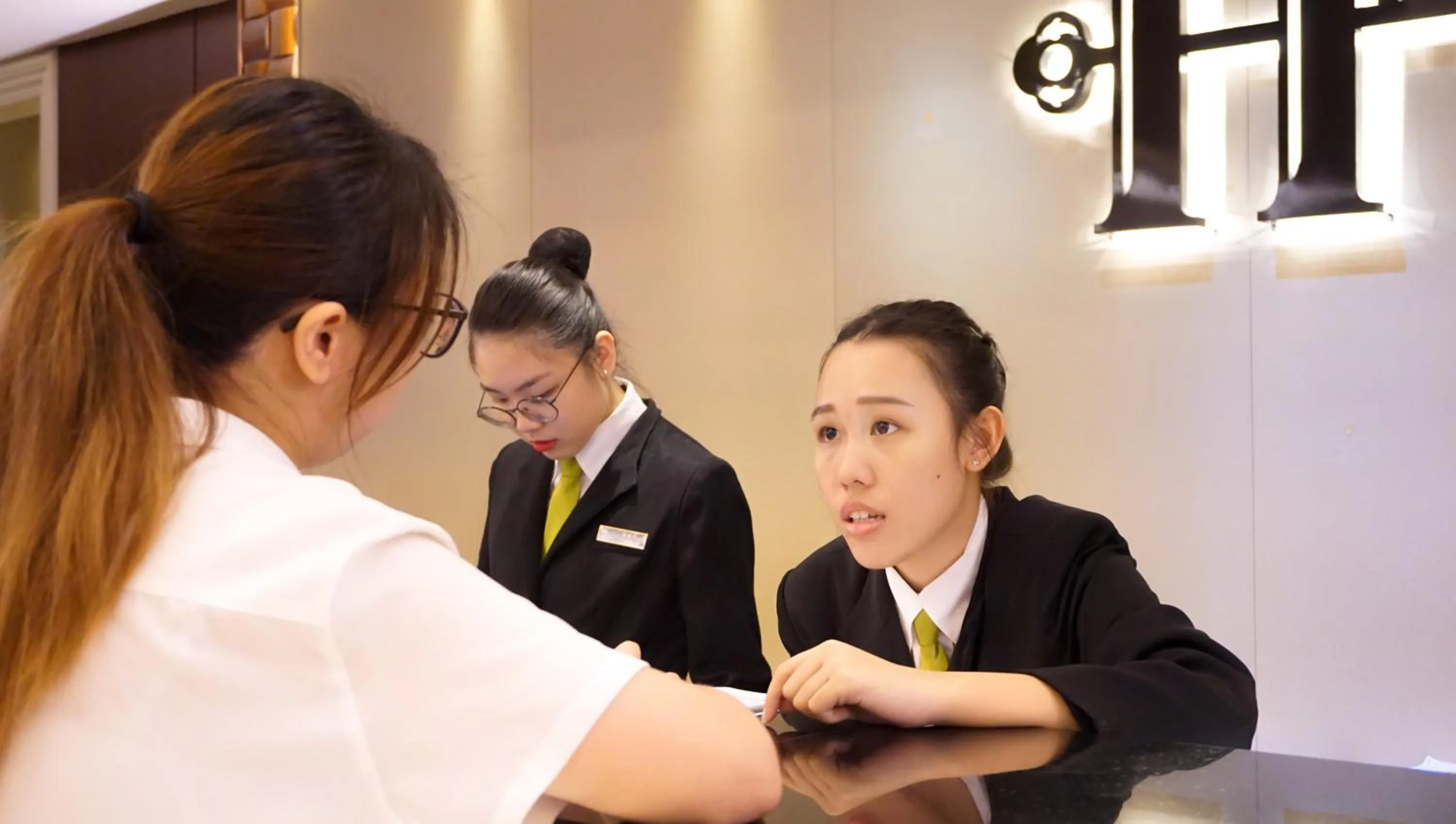 Staff in HiONE Holiday Hotel