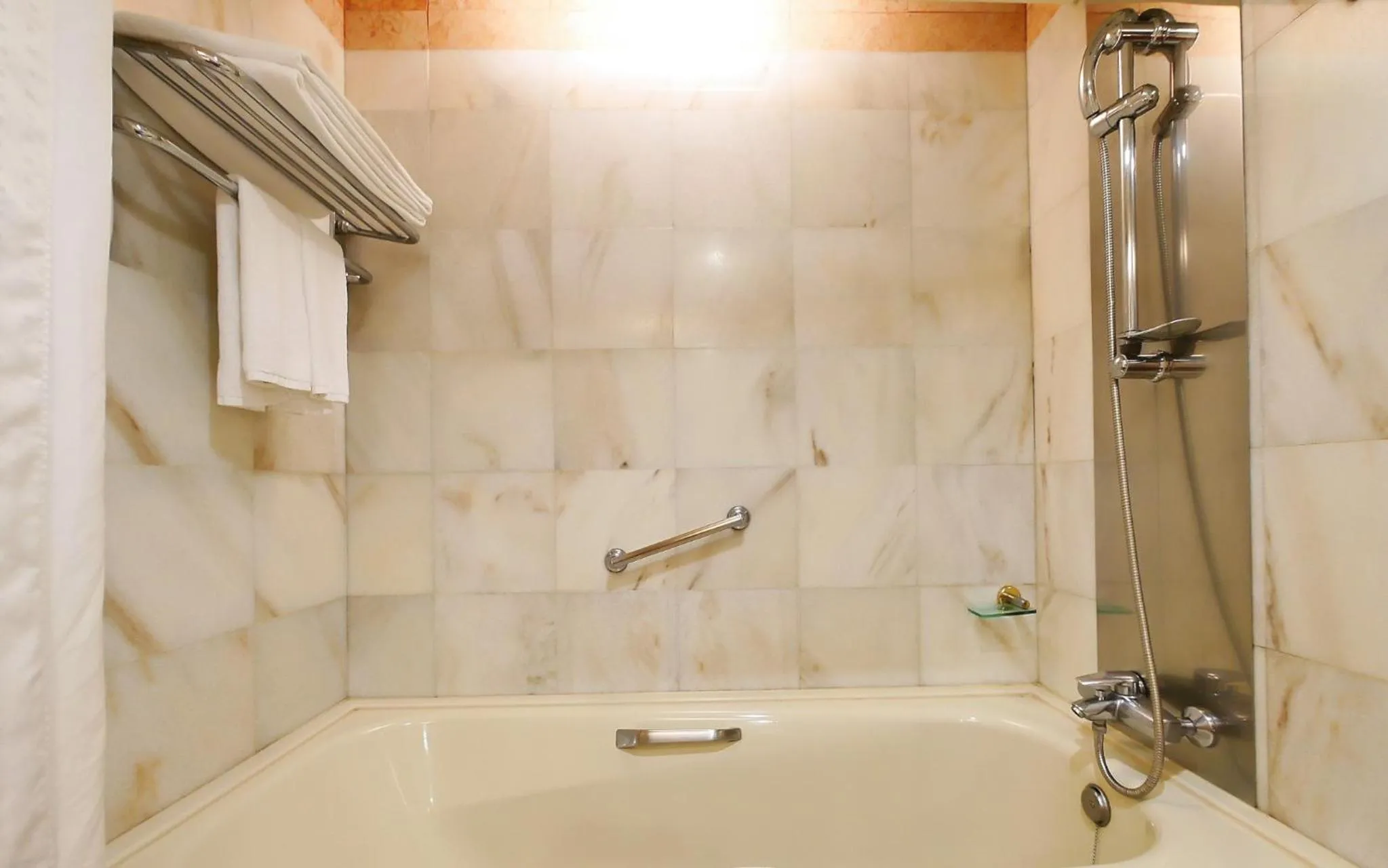 Bathroom in HiONE Holiday Hotel