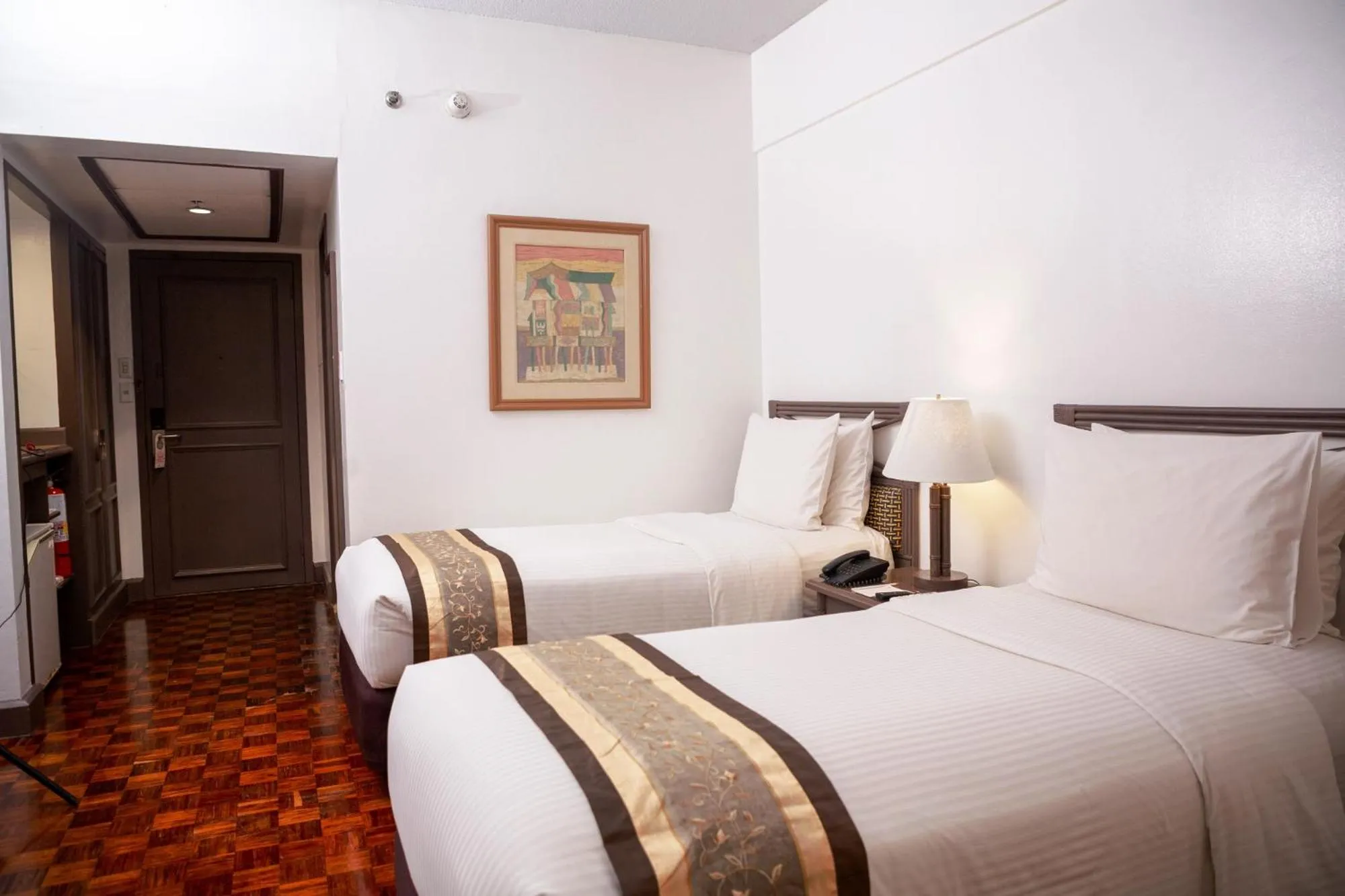 Bed in Waterfront Insular Hotel Davao