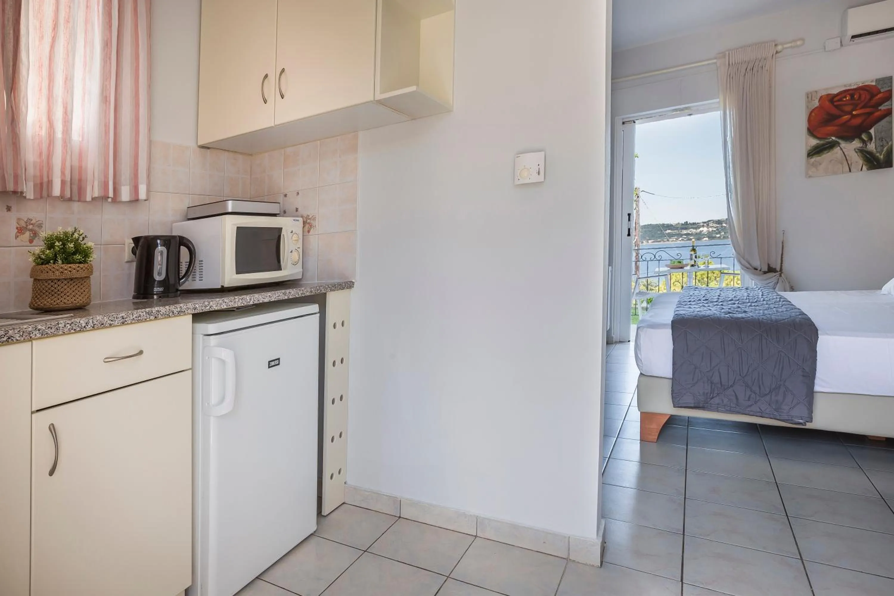 Kitchen or kitchenette in Panorama Fanari studios and apartments