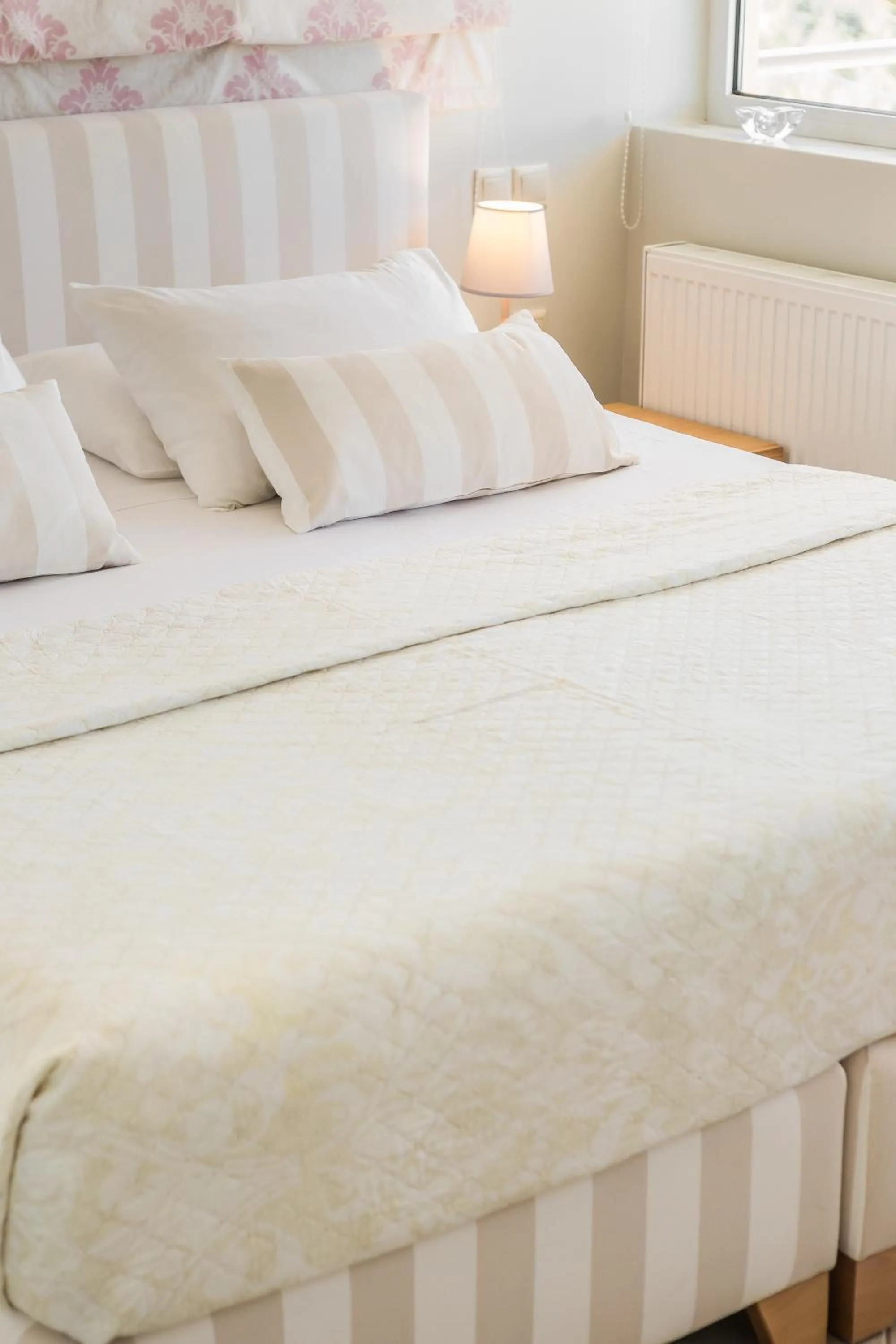 Bed in Panorama Fanari studios and apartments