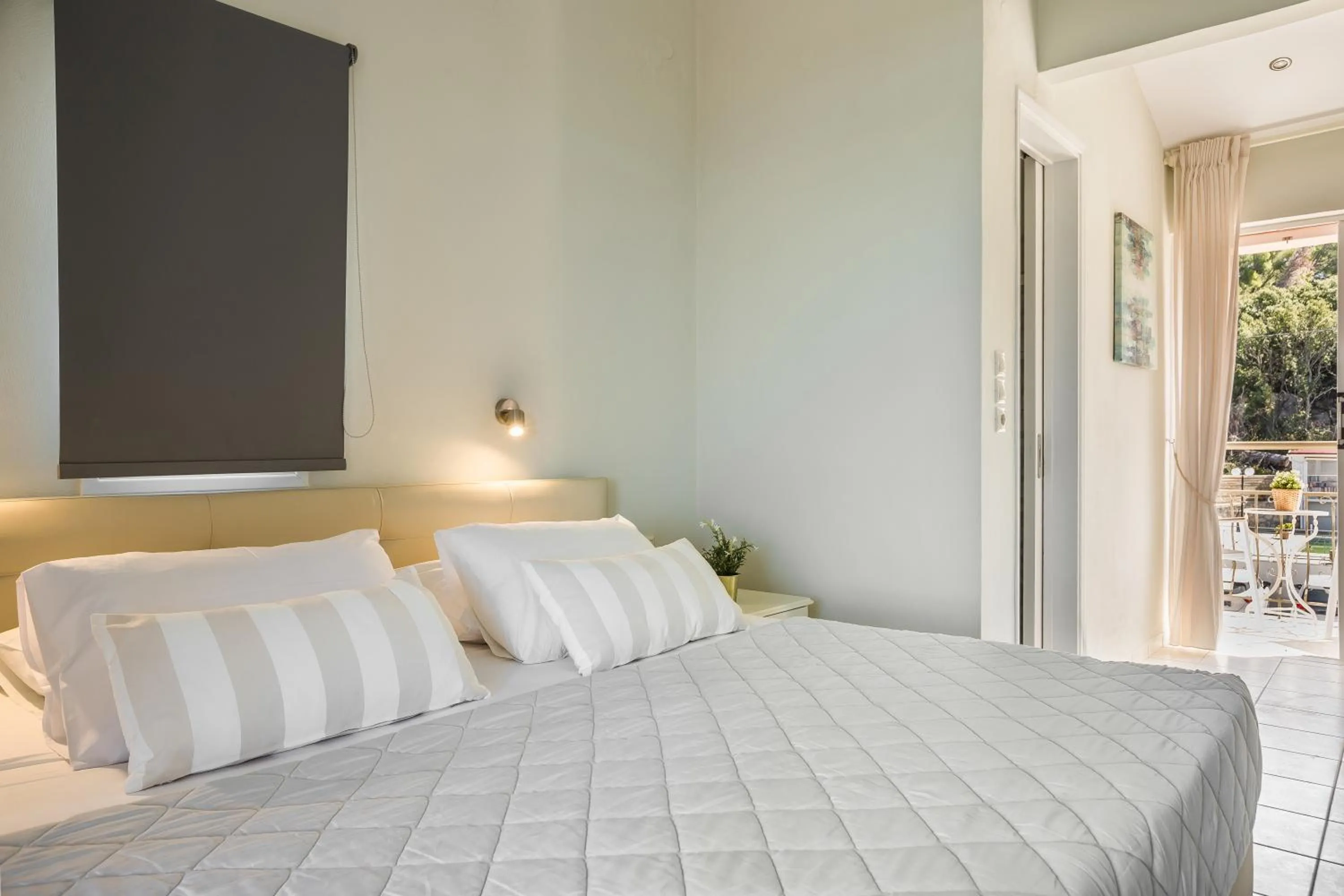 Bed in Panorama Fanari studios and apartments