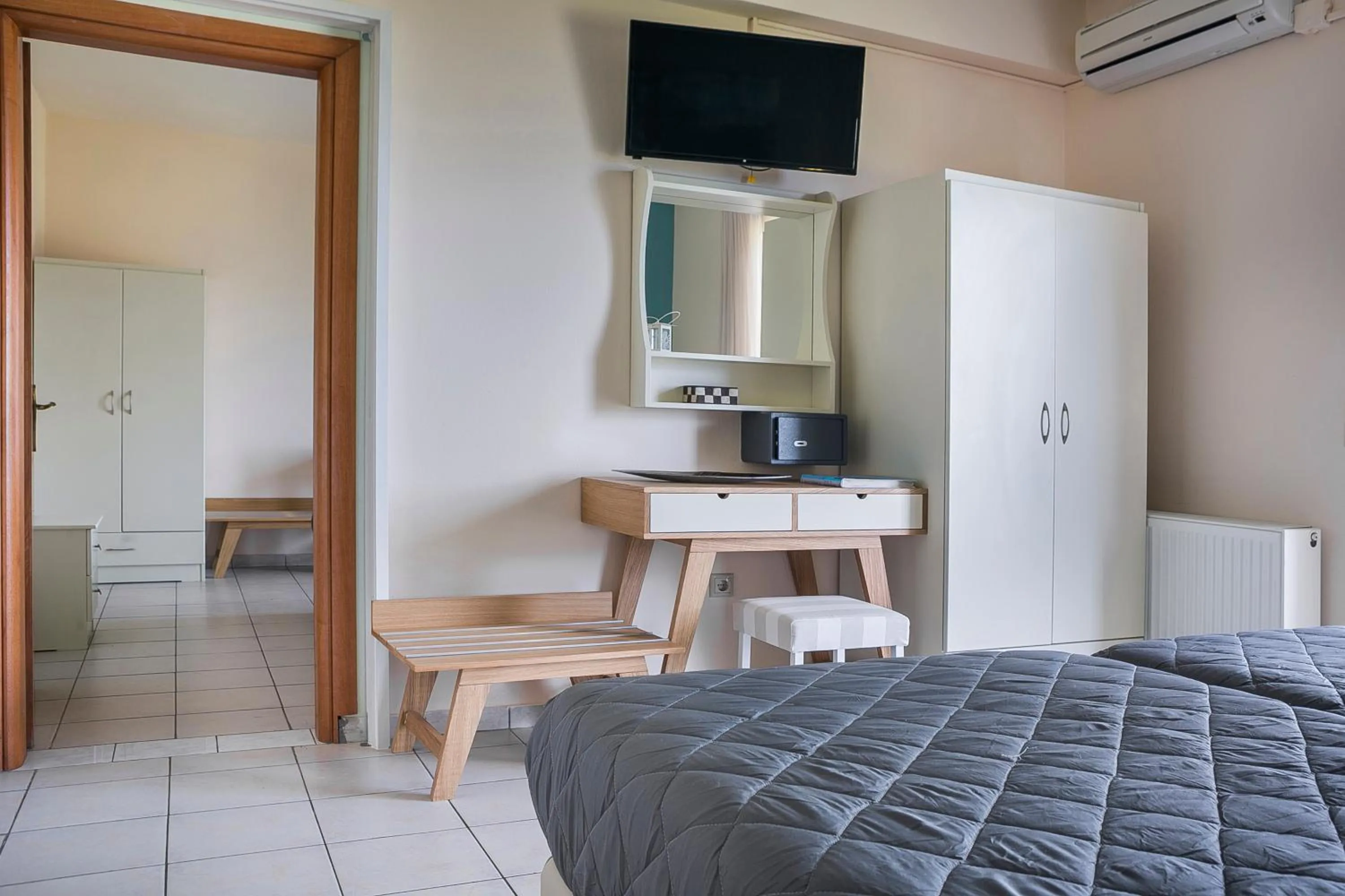 Bed in Panorama Fanari studios and apartments