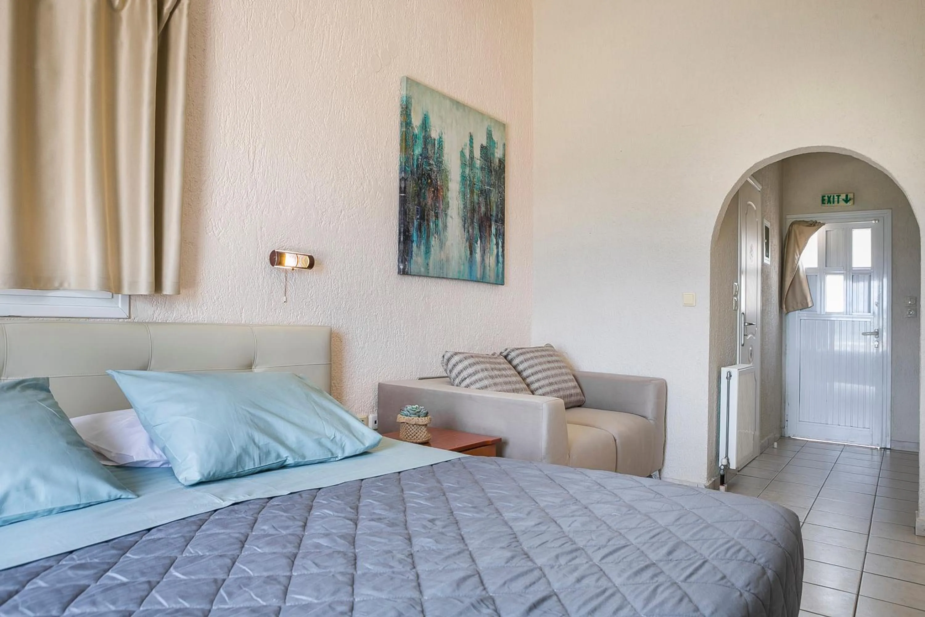 Bed in Panorama Fanari studios and apartments