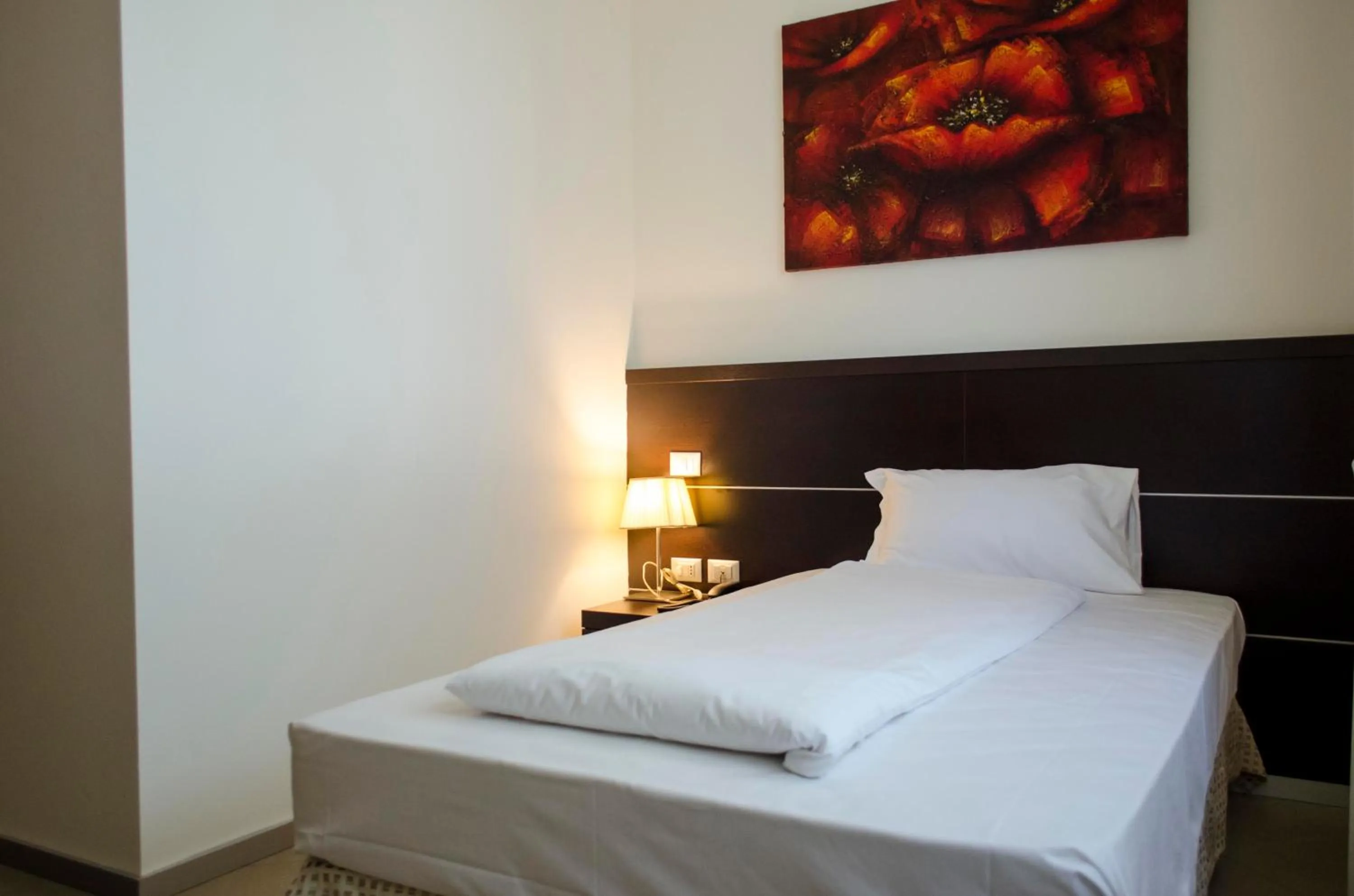 Bed in GREEN GARDEN Resort - Smart Hotel