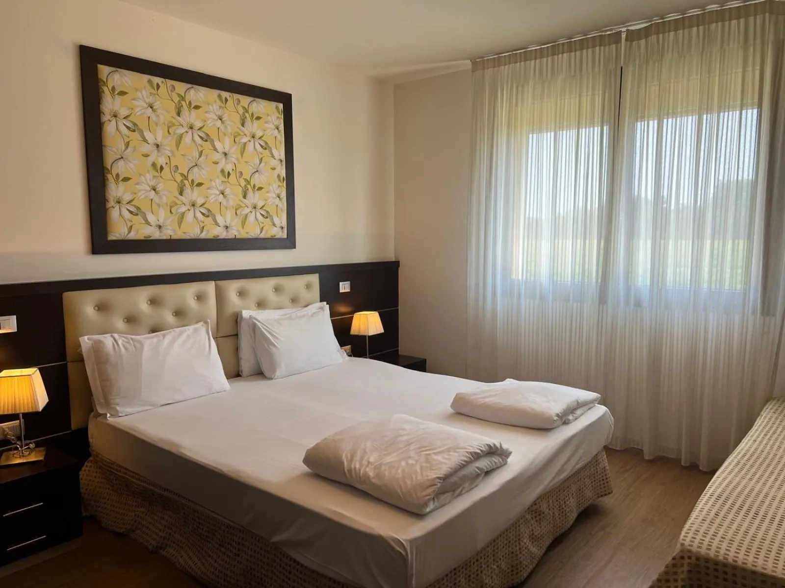 Bed in GREEN GARDEN Resort - Smart Hotel