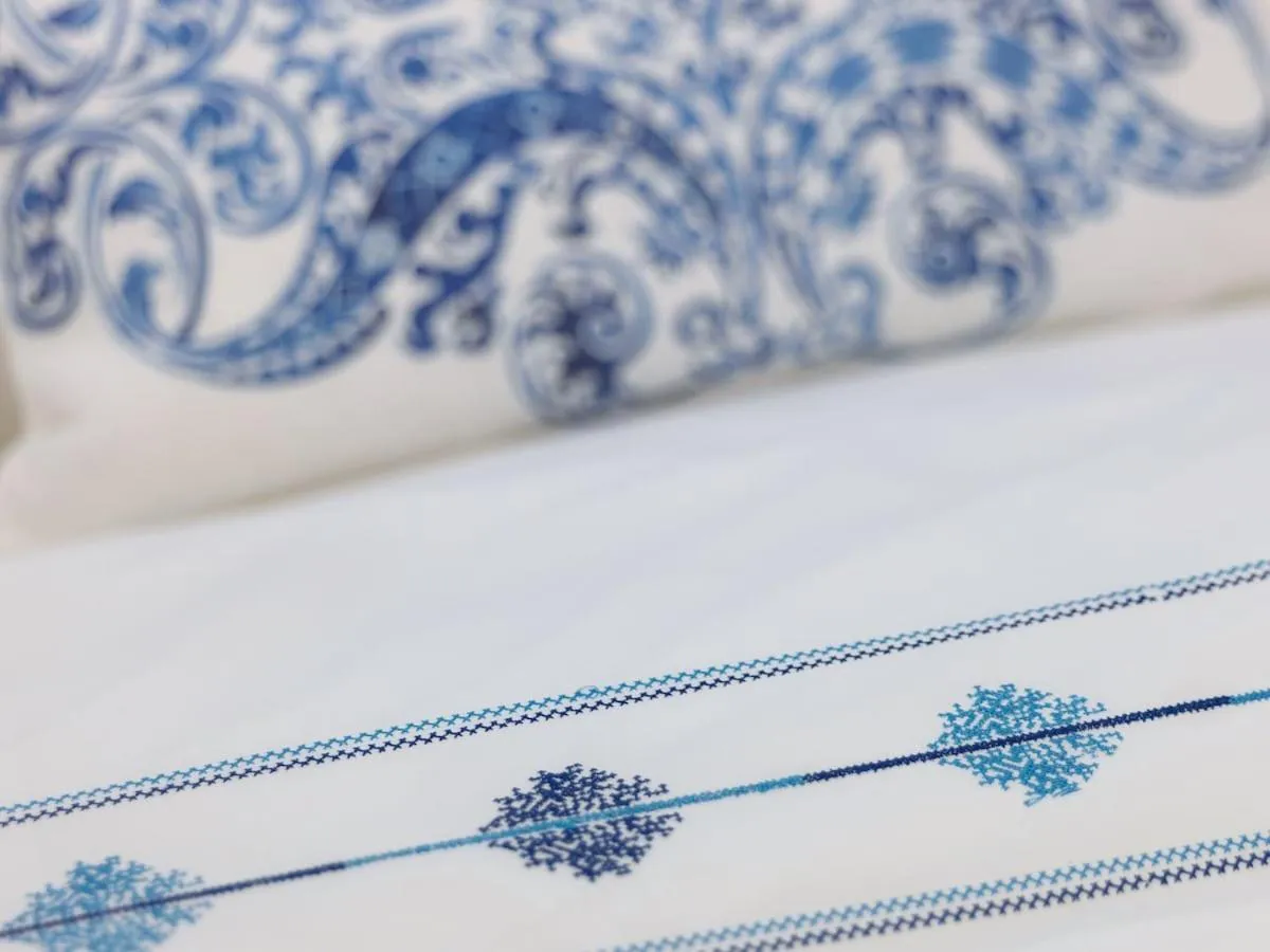 Bed in AFOURA HOUSES by K&K