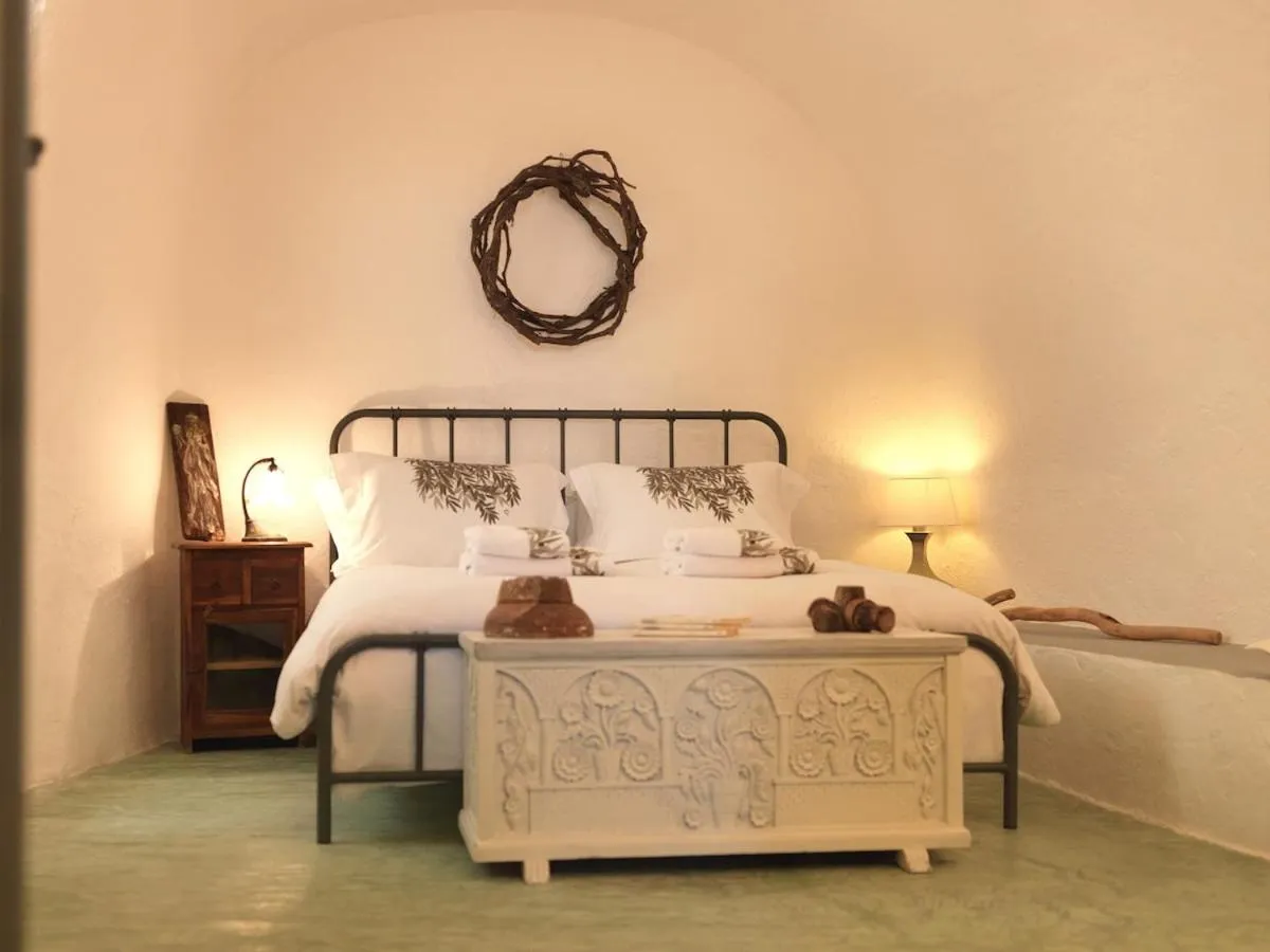 Bed in AFOURA HOUSES by K&K