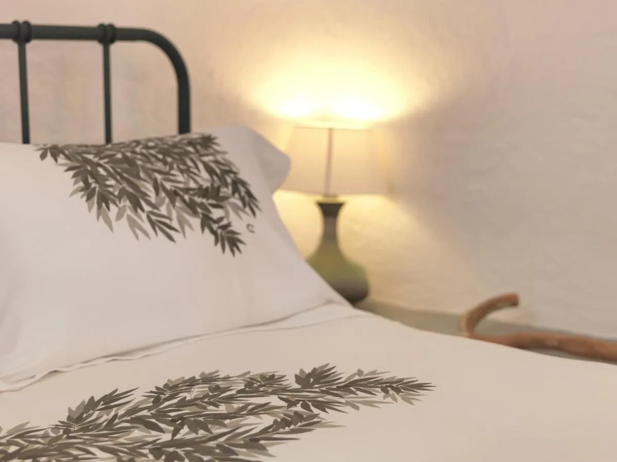 Bed in AFOURA HOUSES by K&K