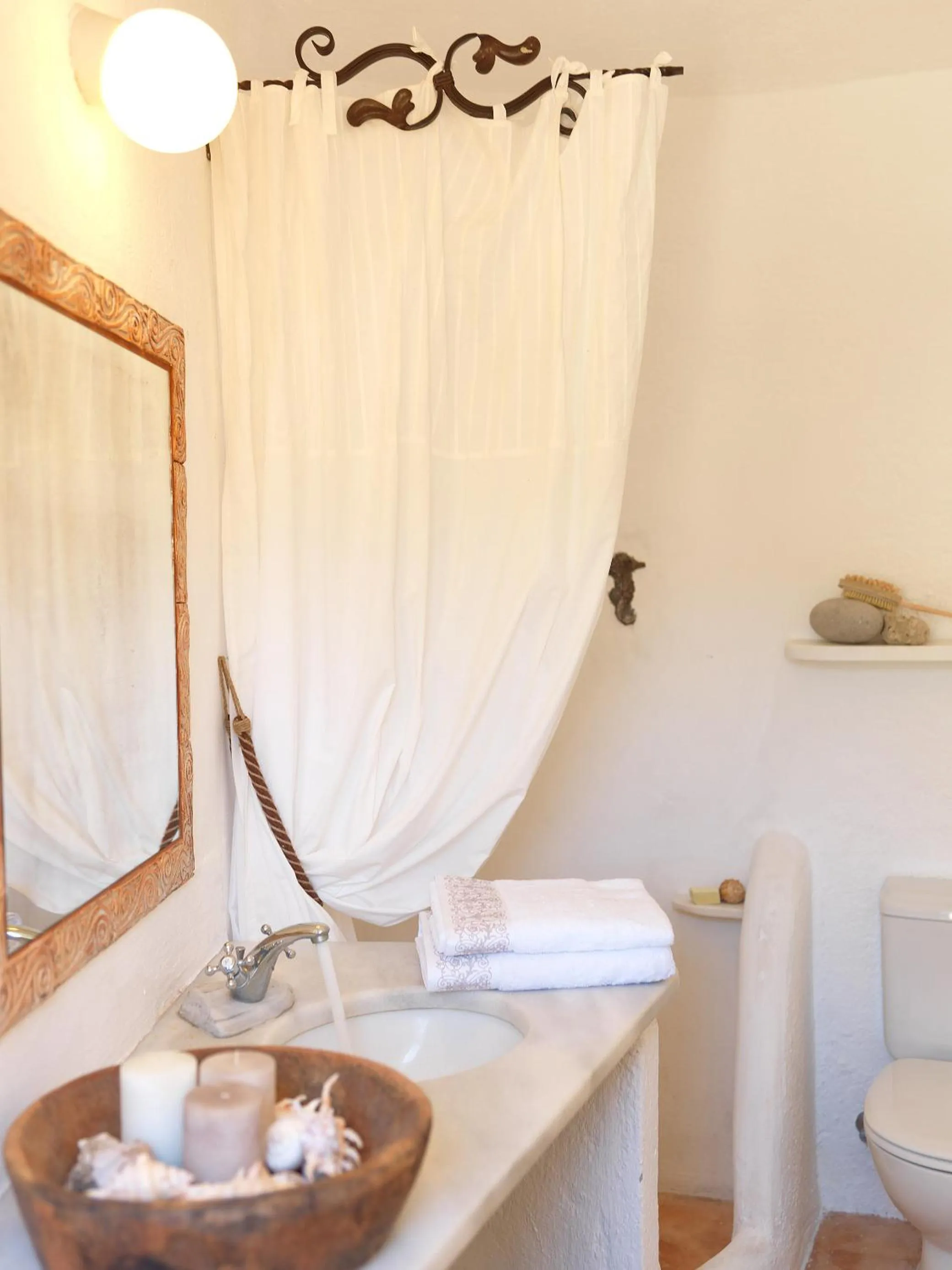 Bathroom in AFOURA HOUSES by K&K