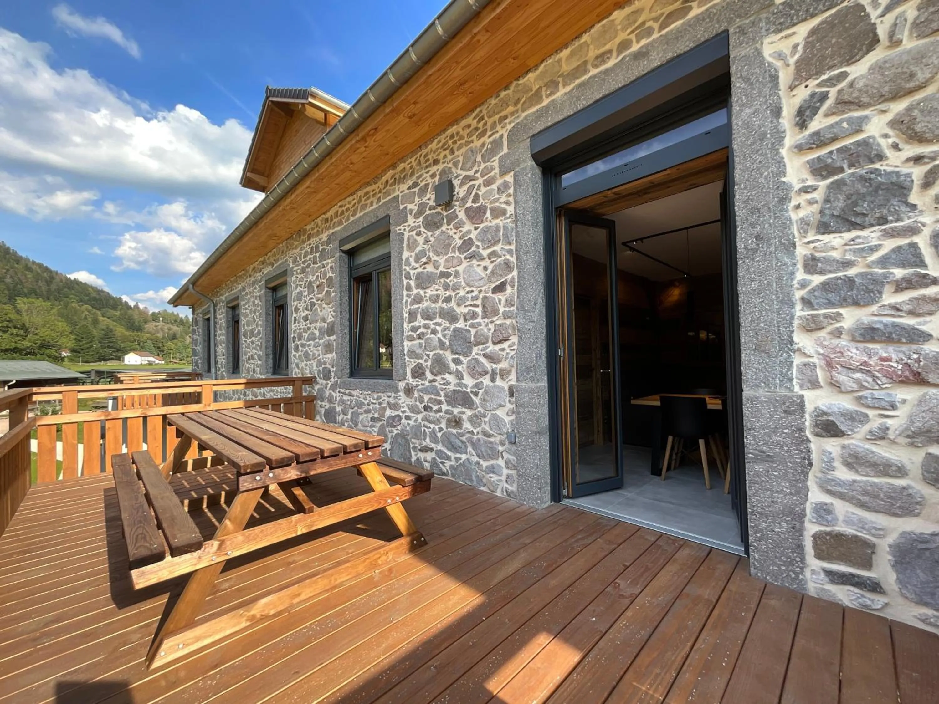 Patio in Gite Roche Des Ducs avec Piscine toute l'année, Spa, Sauna, Hammam