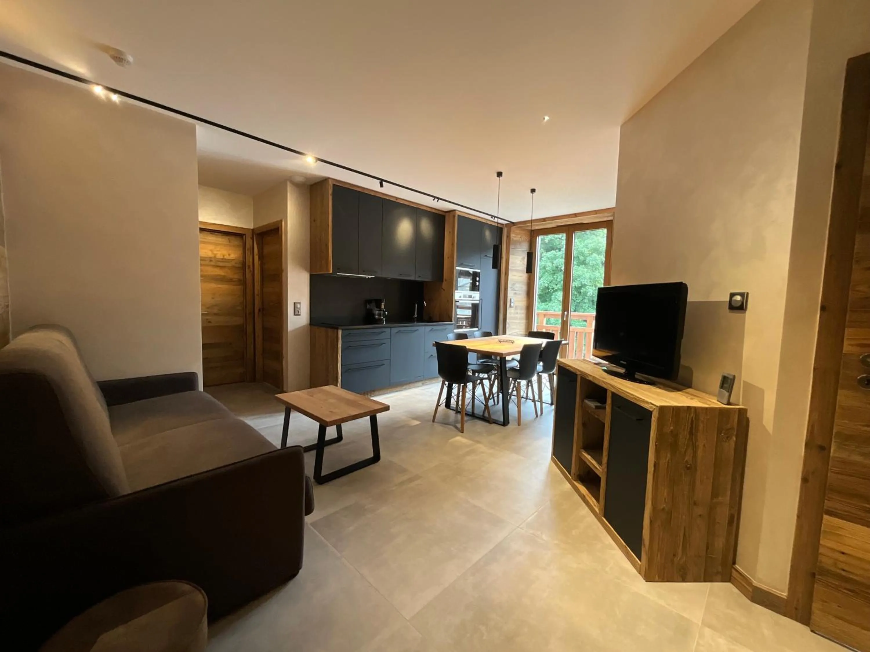 Kitchen or kitchenette in Gite Roche Des Ducs avec Piscine toute l'année, Spa, Sauna, Hammam