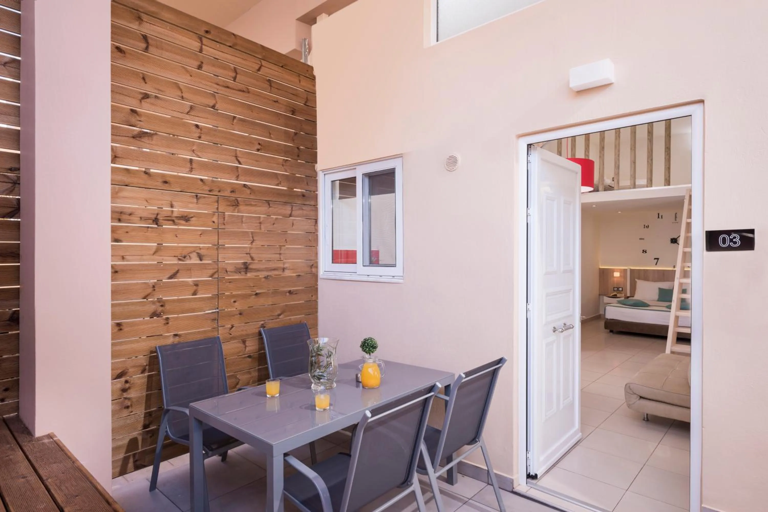 Dining area, Bed in Sea & City Apartments