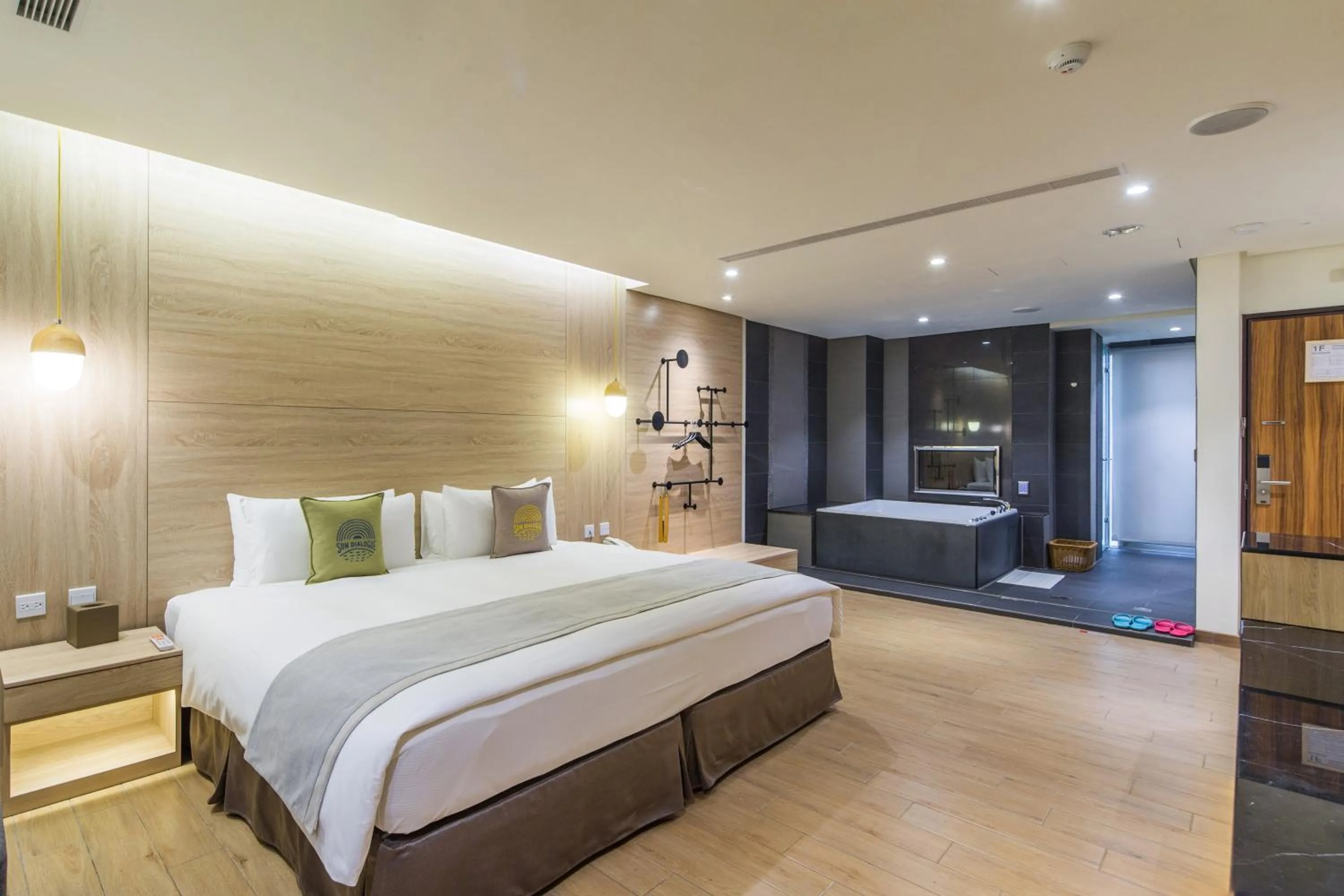 Photo of the whole room, Bed in Sun Dialogue Hotel-By Cosmos Creation