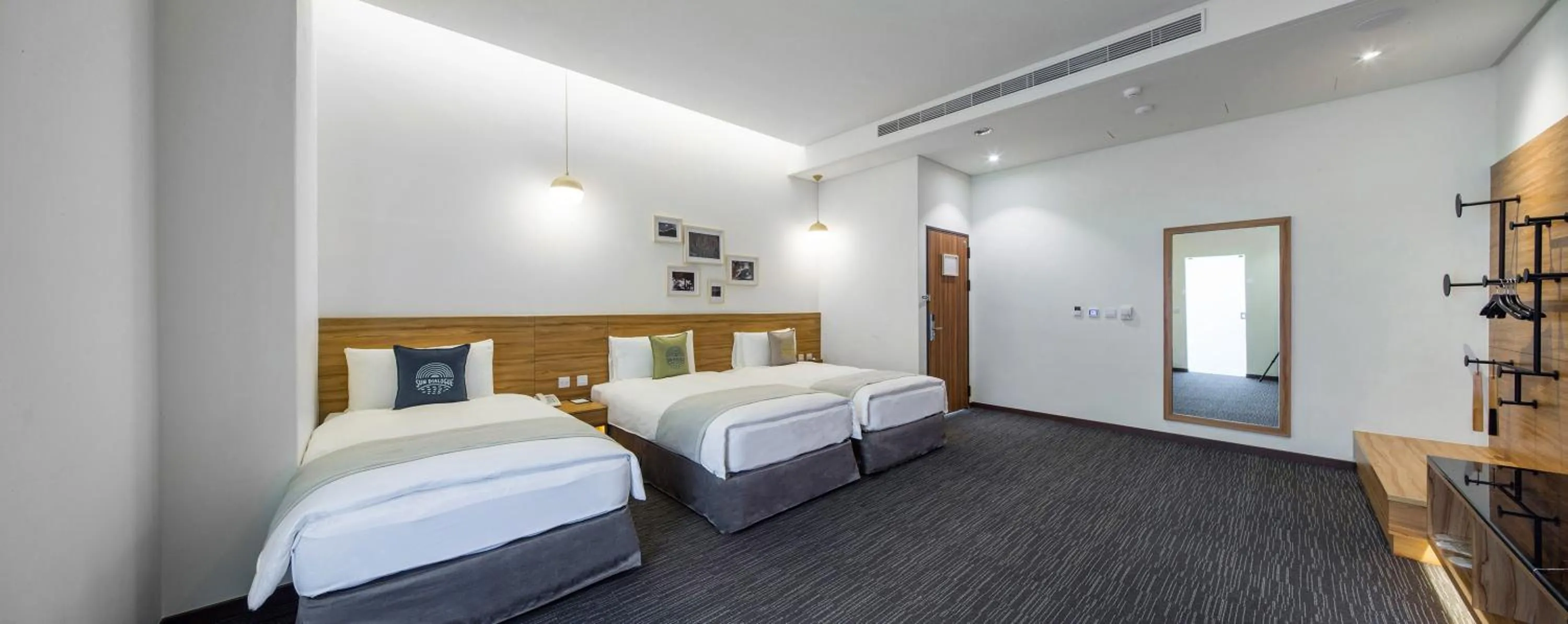 Photo of the whole room, Bed in Sun Dialogue Hotel-By Cosmos Creation