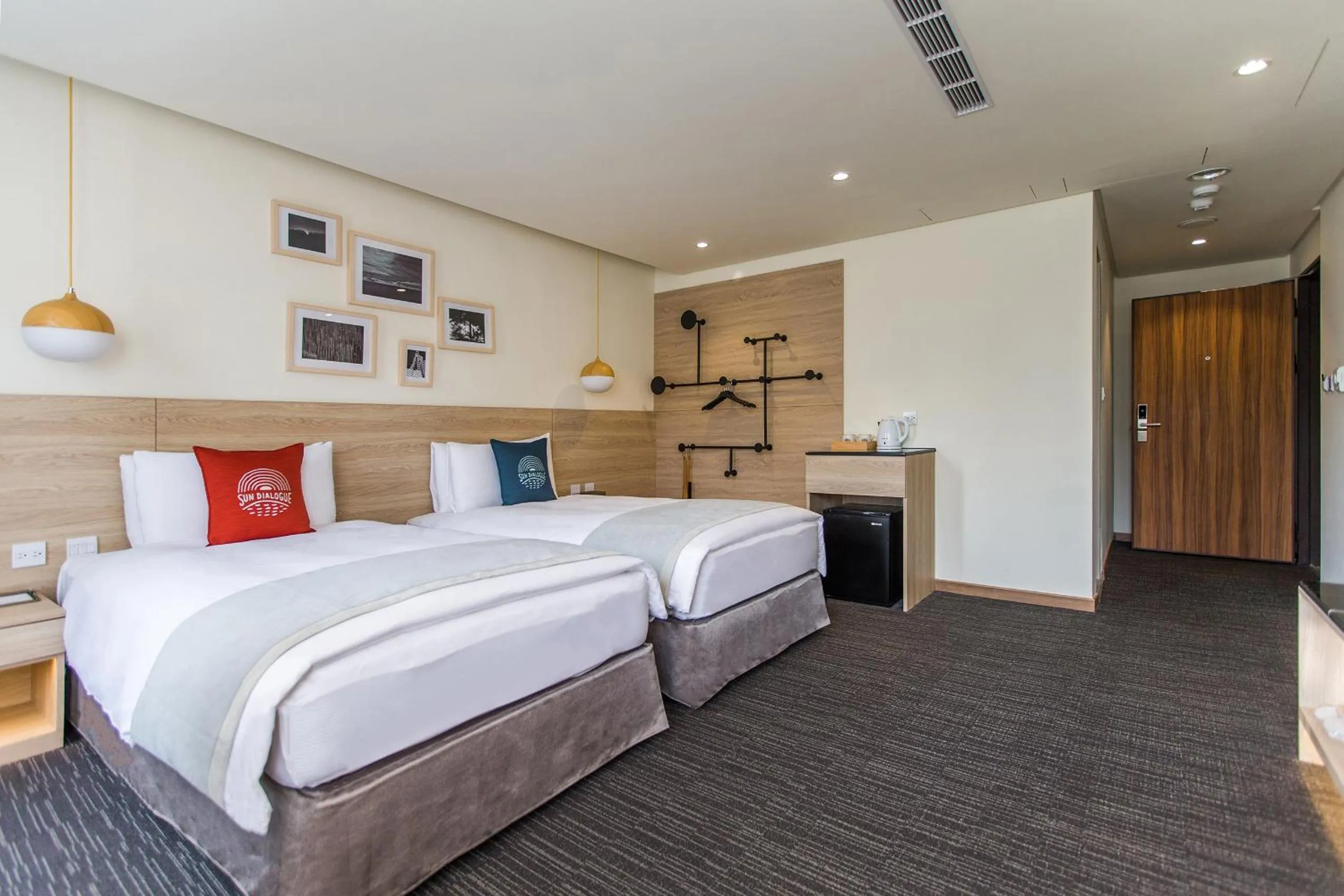 Photo of the whole room, Bed in Sun Dialogue Hotel-By Cosmos Creation