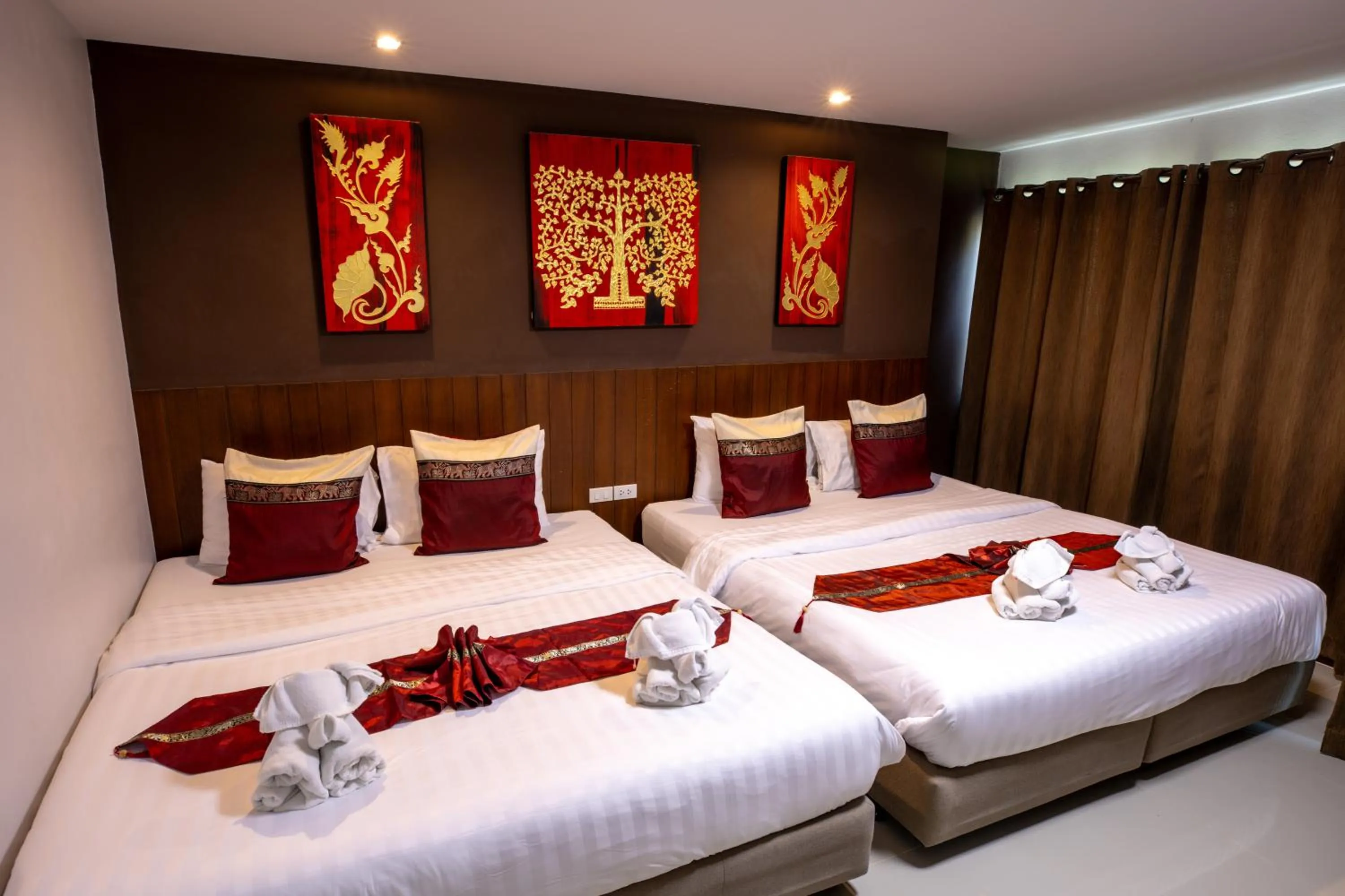 Bed in Huen Jao Ban Hotel