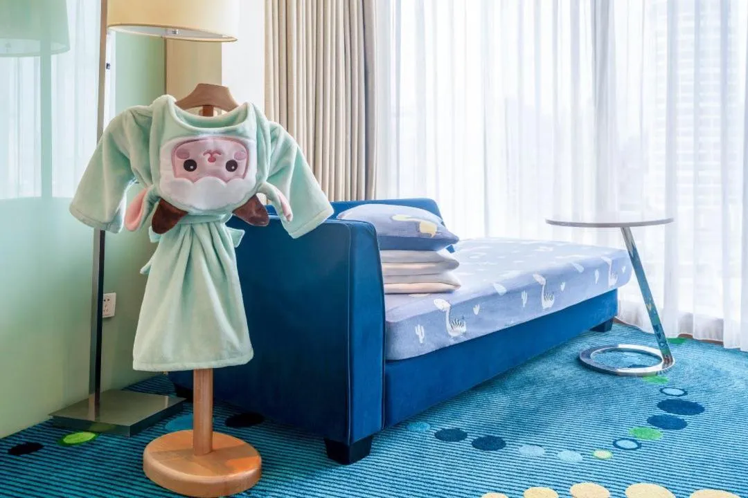 Bed in Renaissance Shanghai Yu Garden Hotel on the Bund