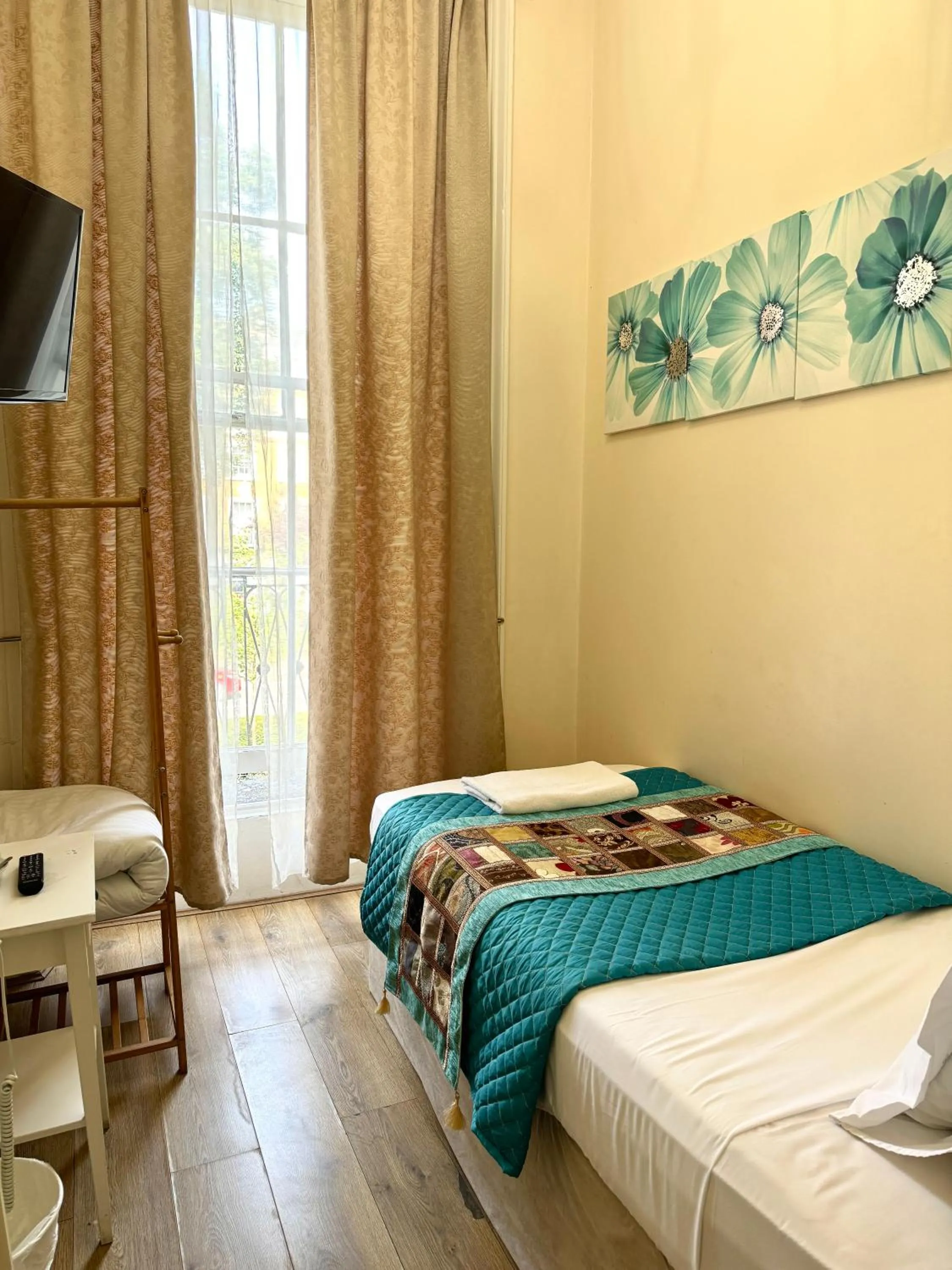 Bed in ABC Hyde Park Hotel