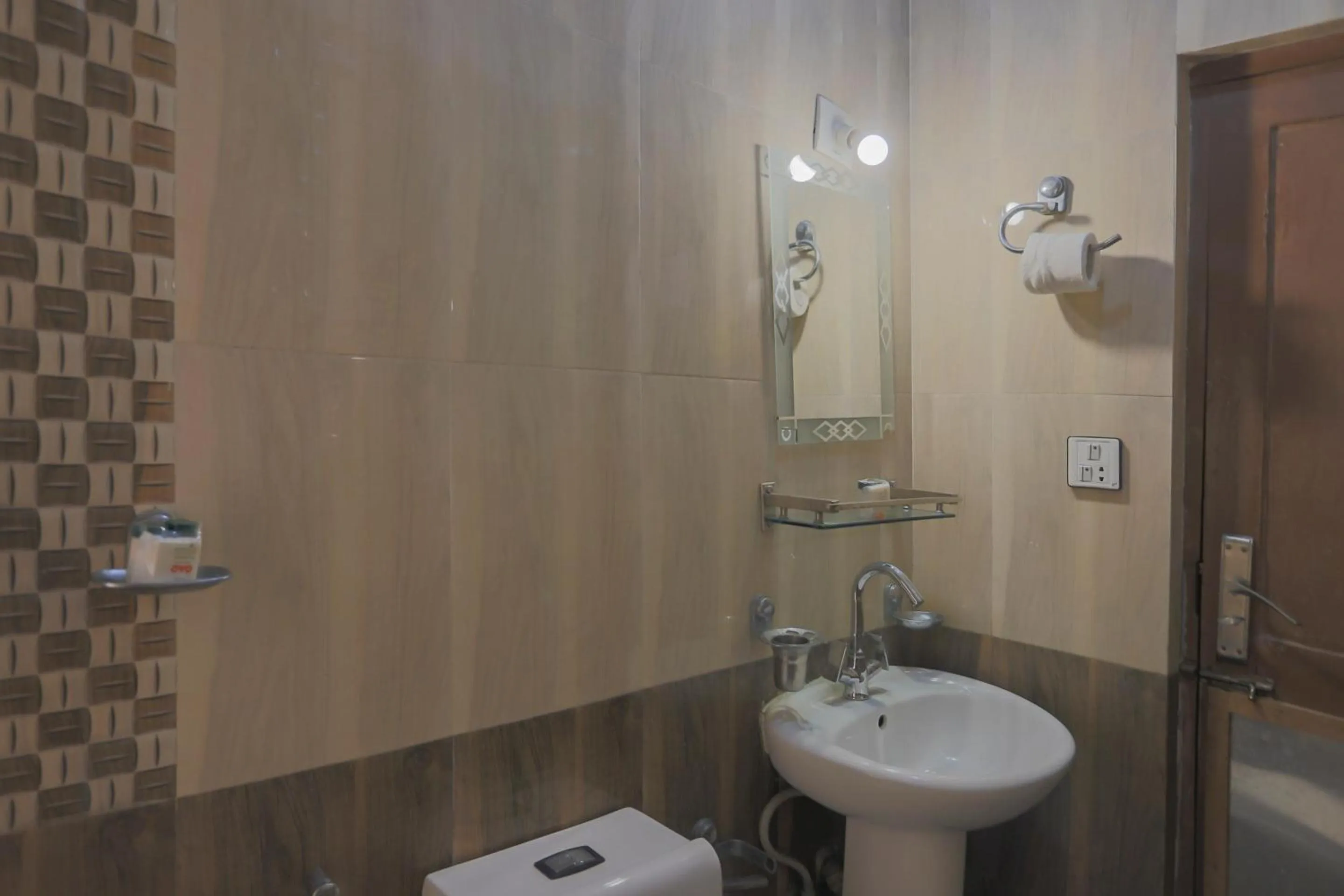 Bathroom in OYO 789 Hotel Shivam Plaza