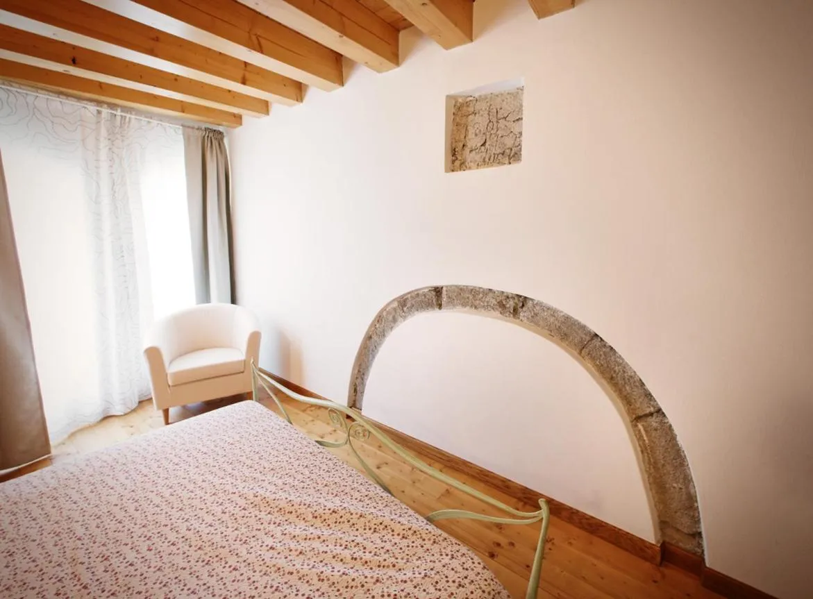 Bed in Albergo Diffuso Tolmezzo
