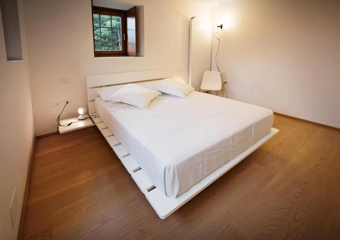 Bed in Albergo Diffuso Tolmezzo