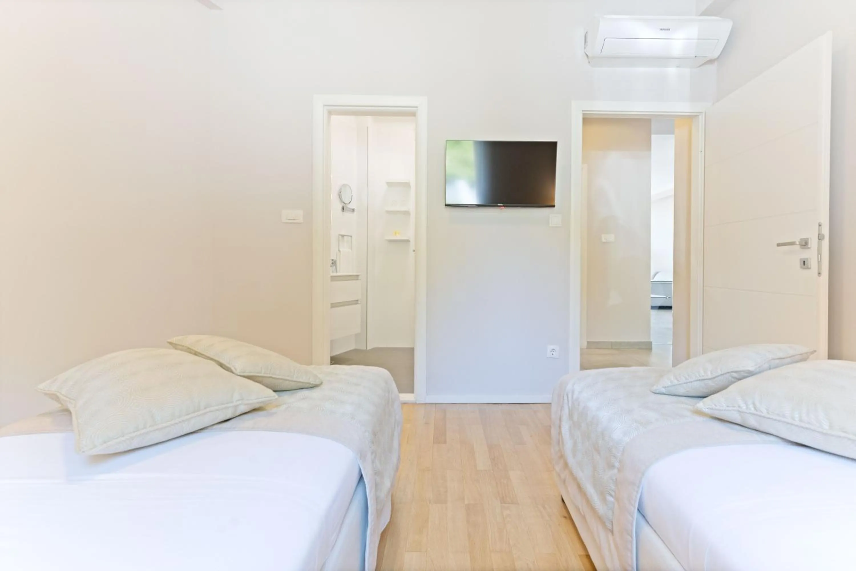 Bed in The Residence Aparthotel