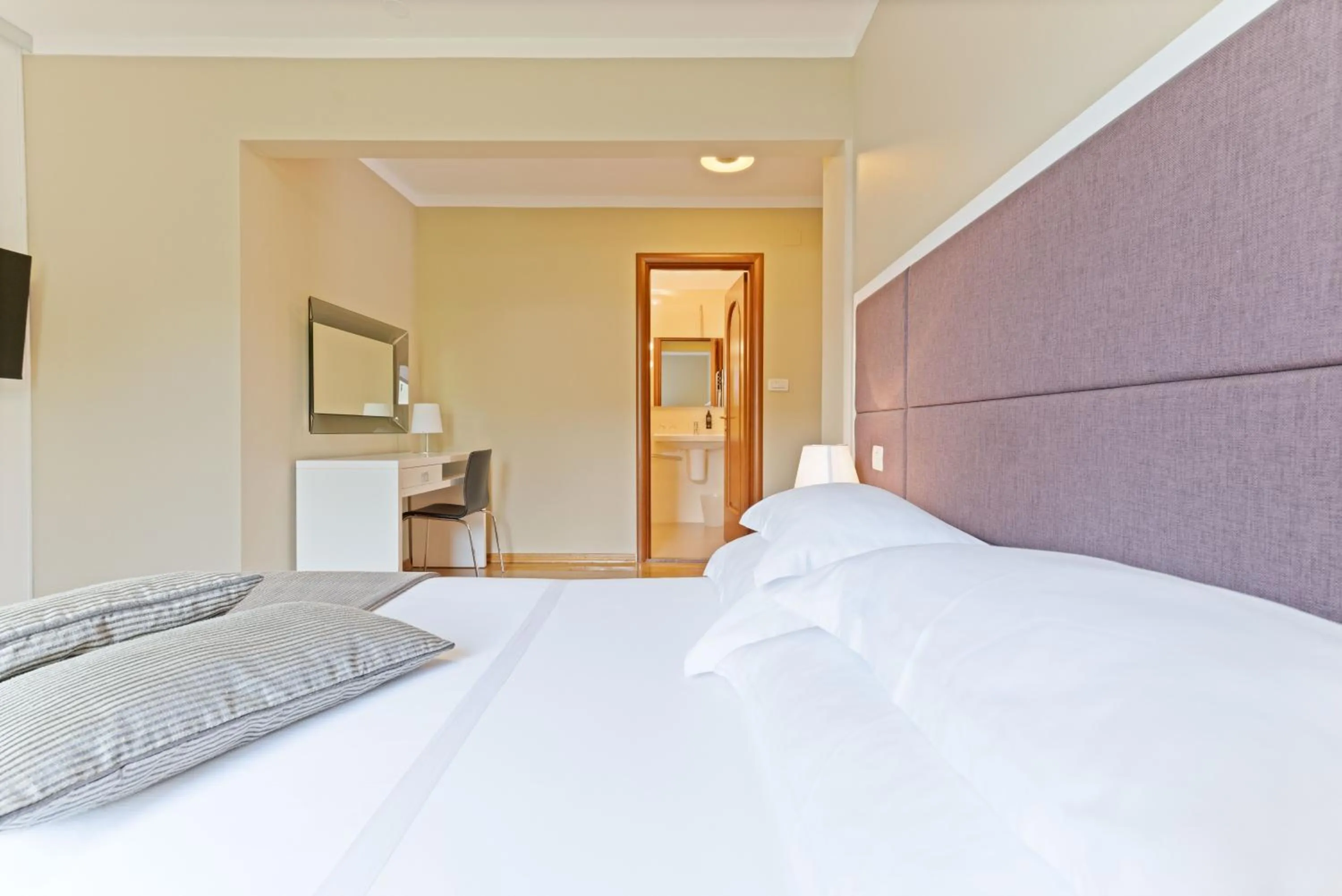 Bed in The Residence Aparthotel