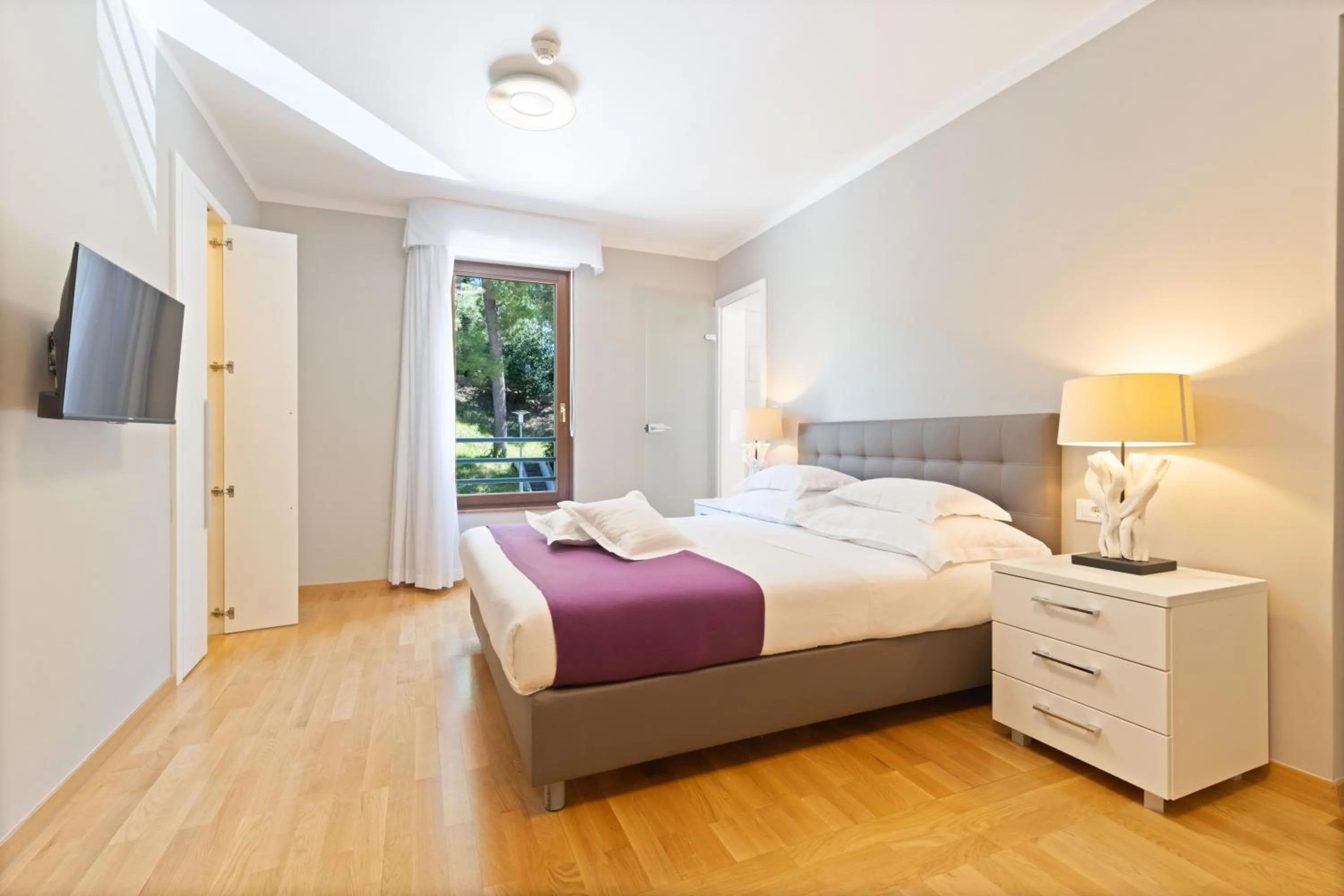 Bed in The Residence Aparthotel