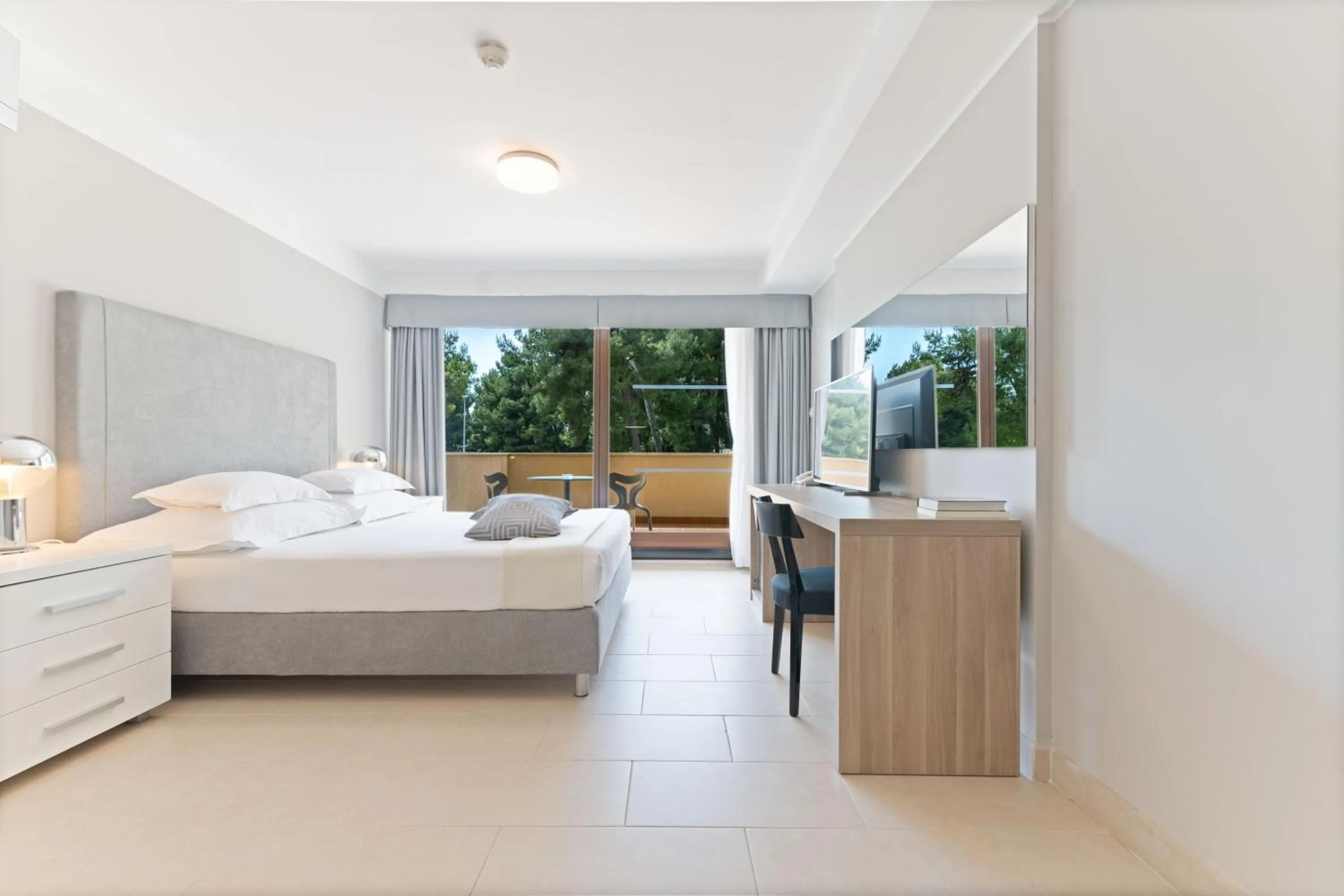 Bed in The Residence Aparthotel