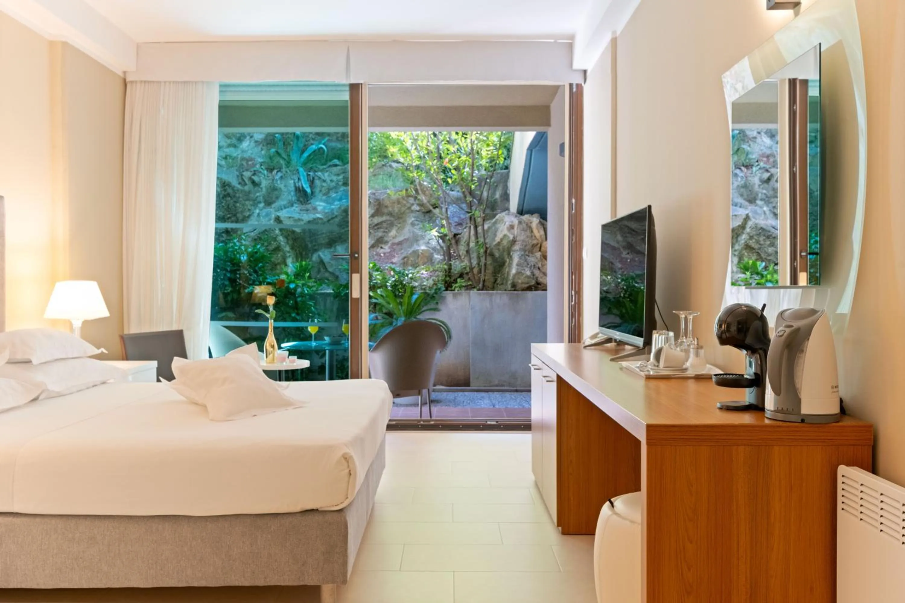 Bed in The Residence Aparthotel