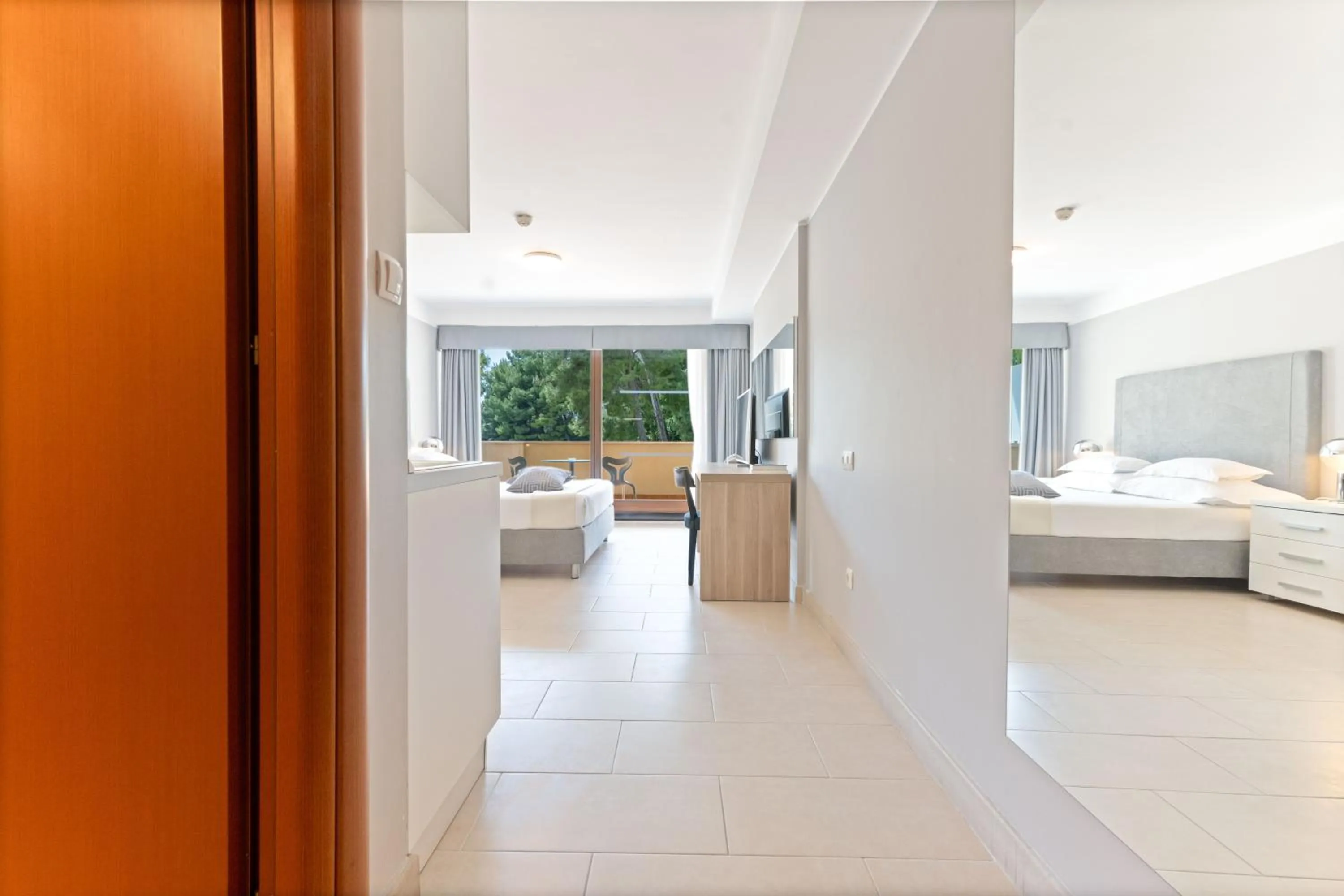 Bed in The Residence Aparthotel