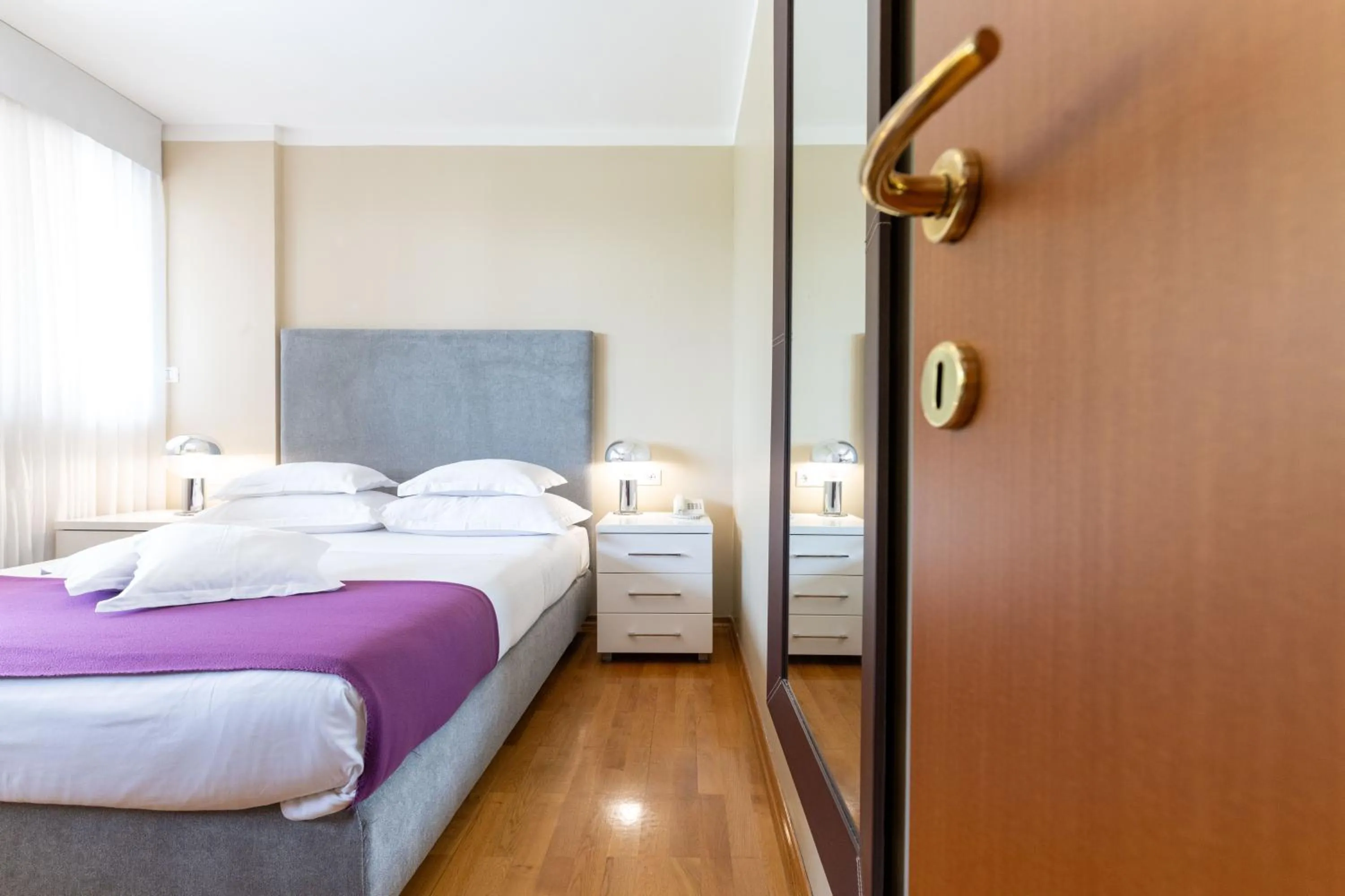 Bed in The Residence Aparthotel