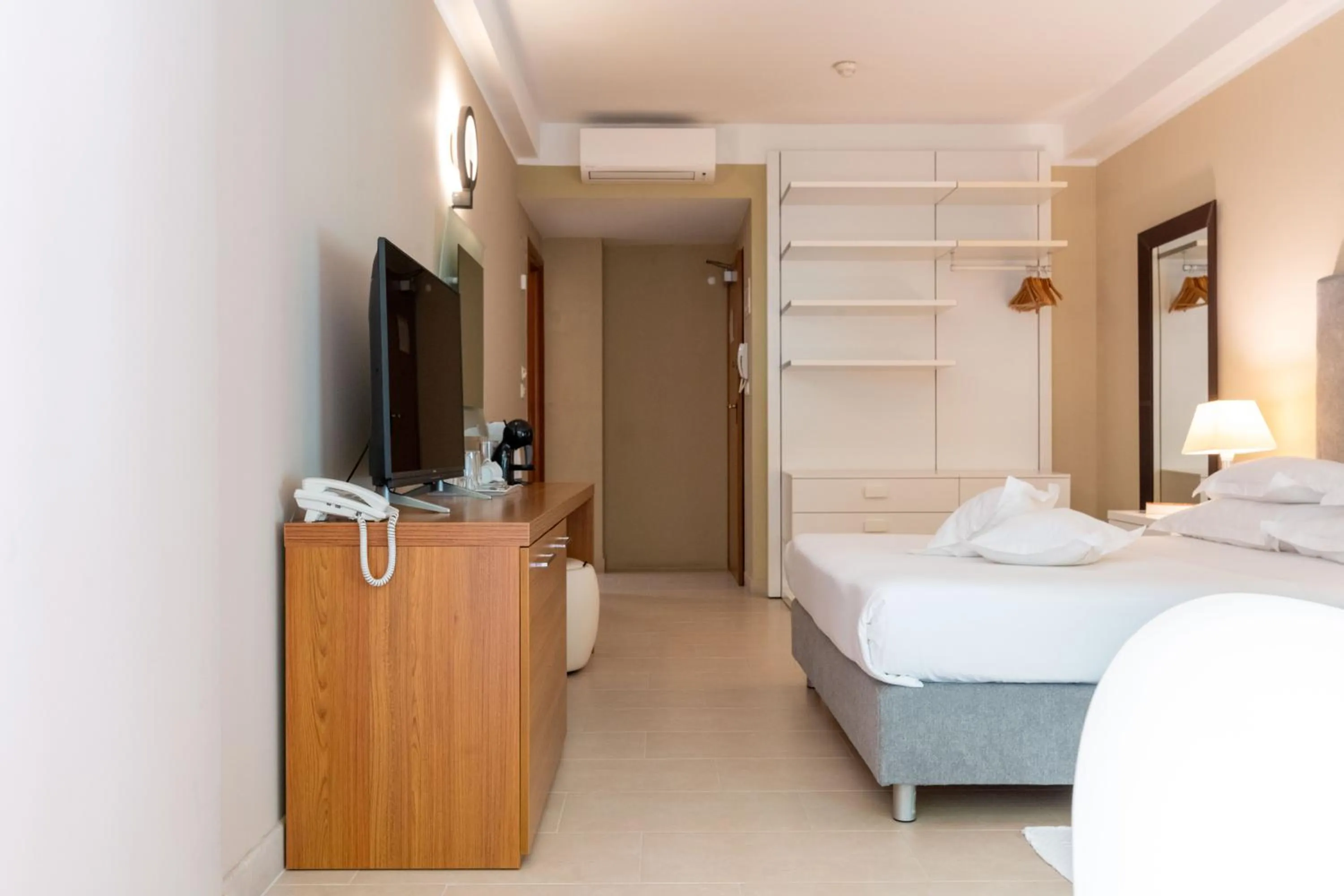 Bed in The Residence Aparthotel