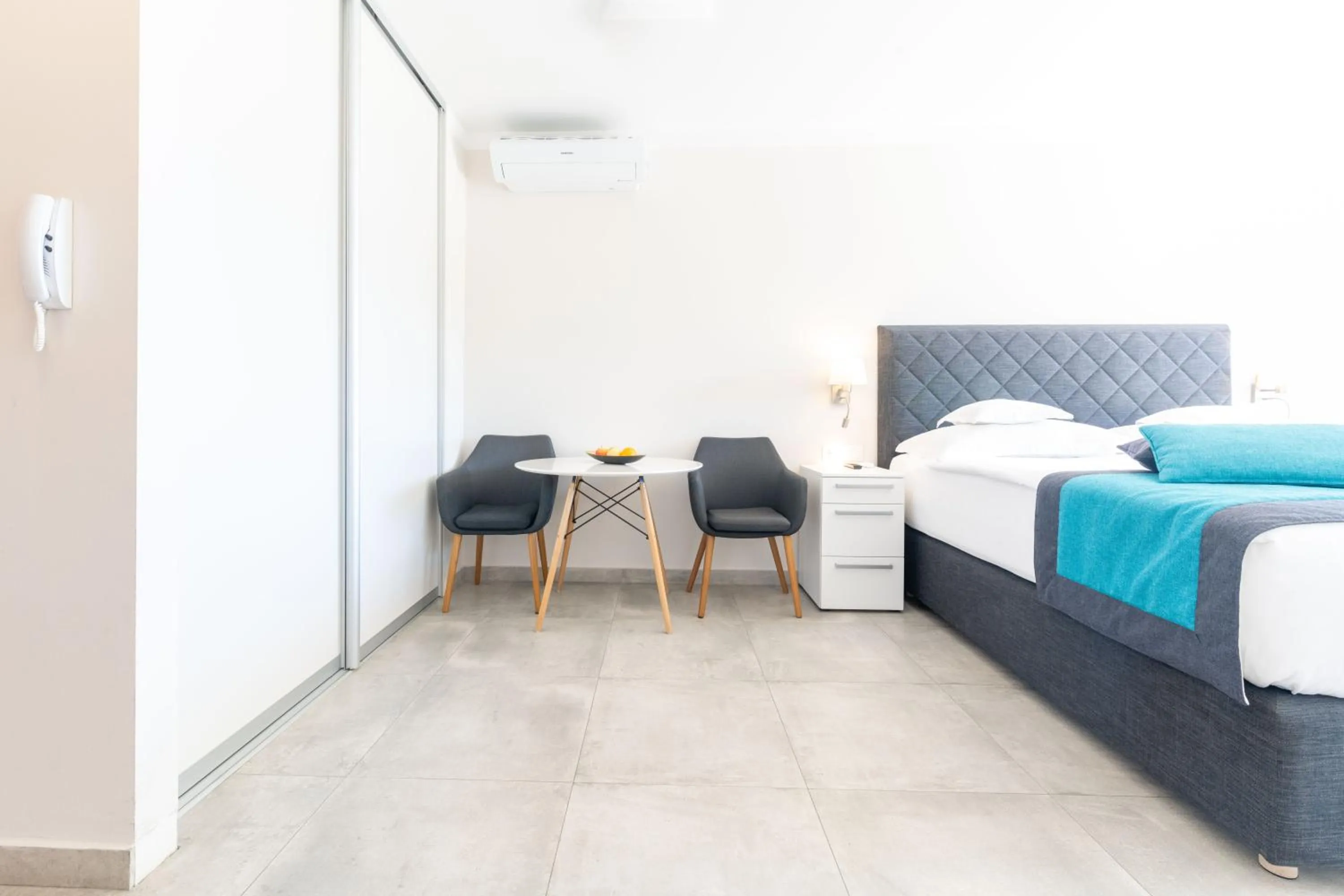 Bed in The Residence Aparthotel