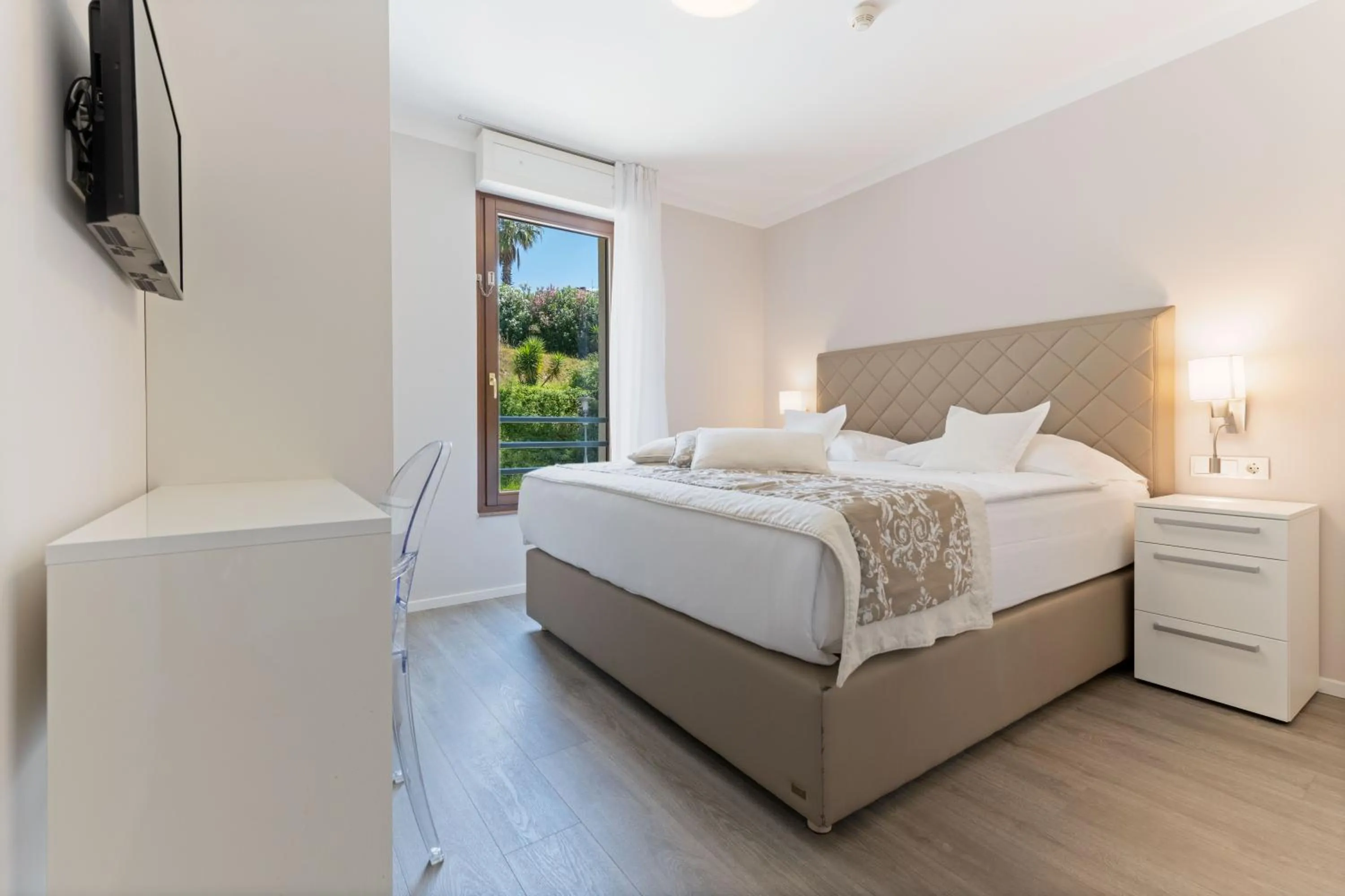 Bed in The Residence Aparthotel