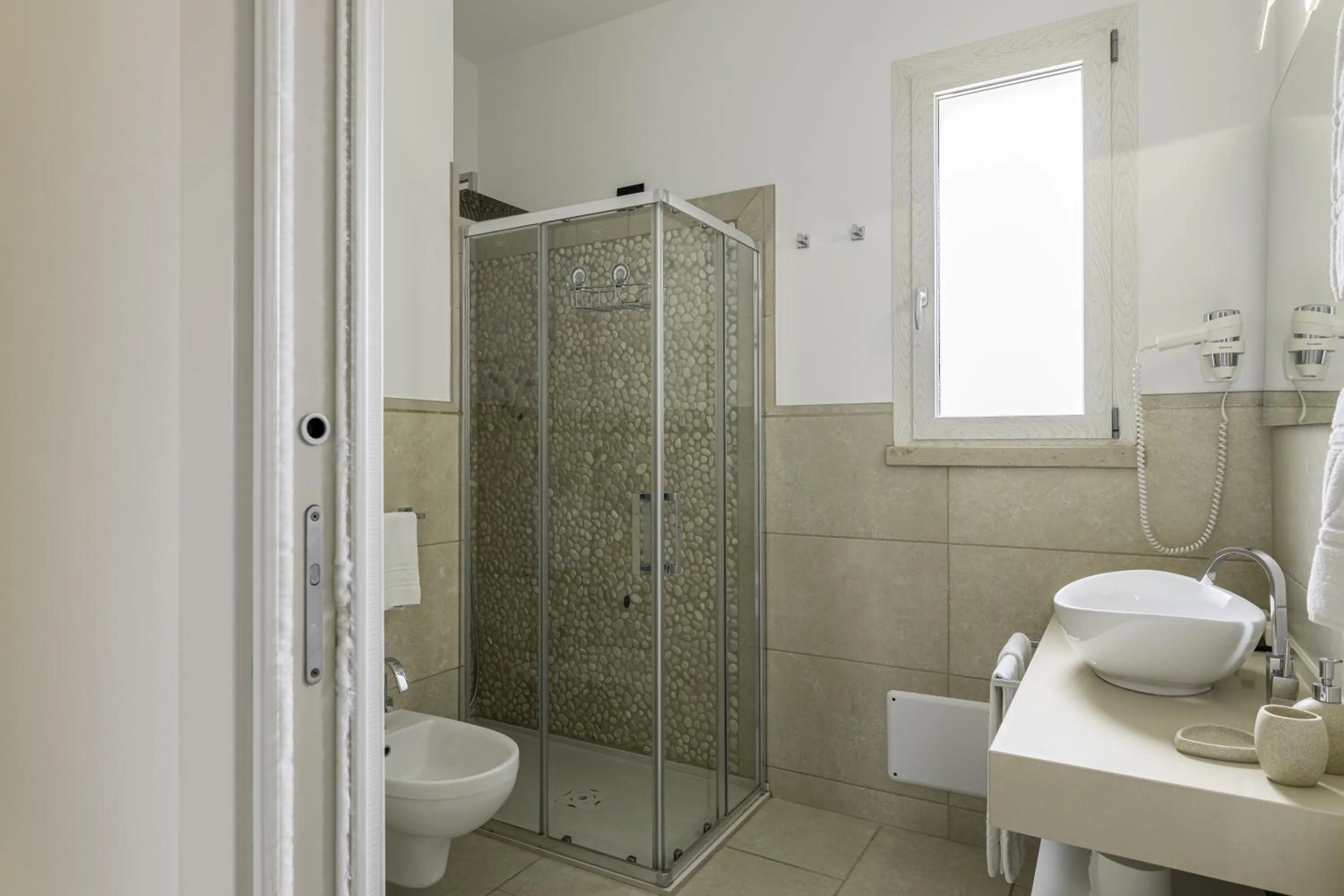 Shower in Masseria Muntibianchi AgriResort Restaurant & SPA