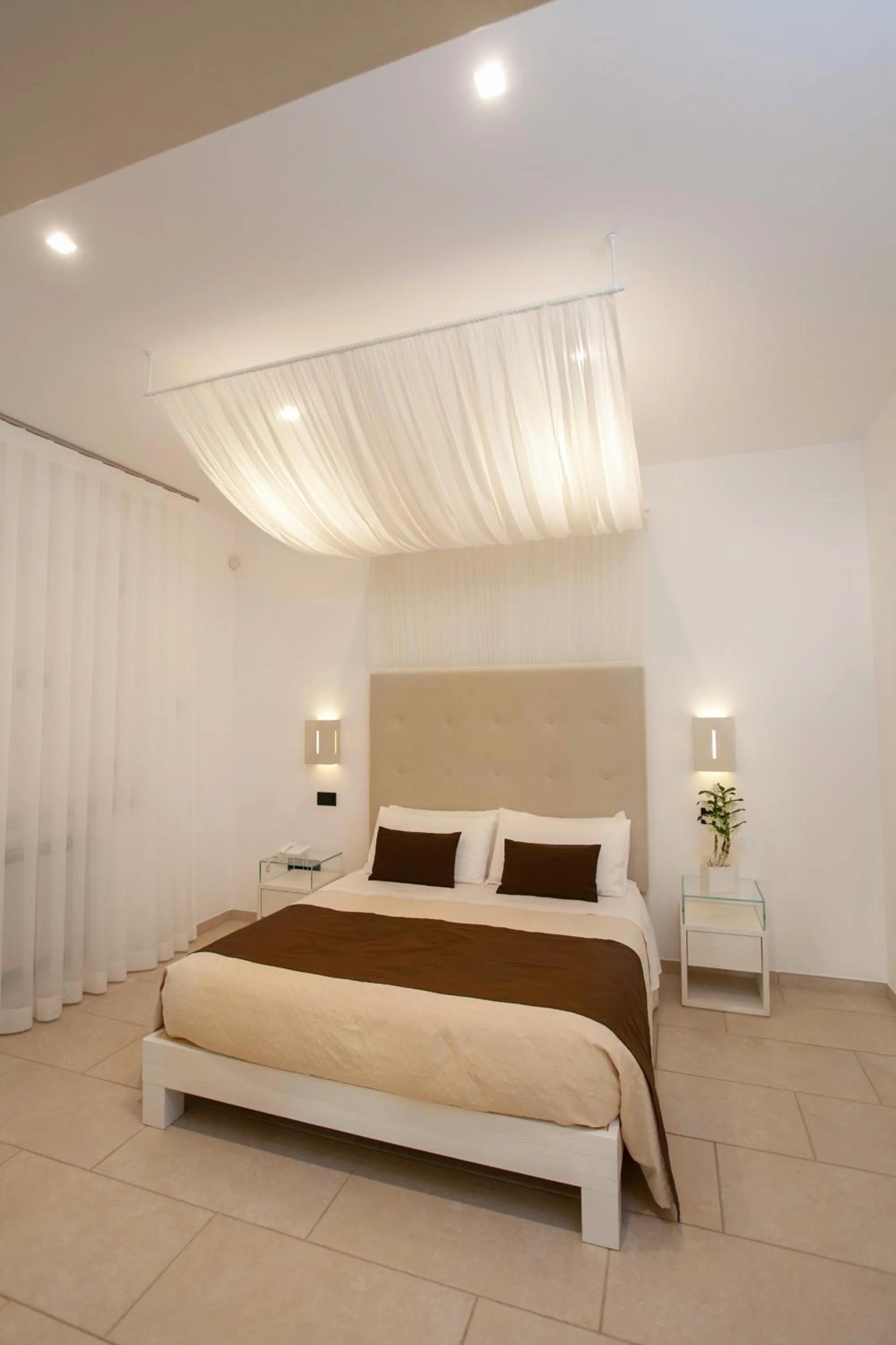 Bed in Masseria Muntibianchi AgriResort Restaurant & SPA