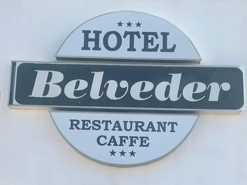 Property logo or sign in Hotel Belveder