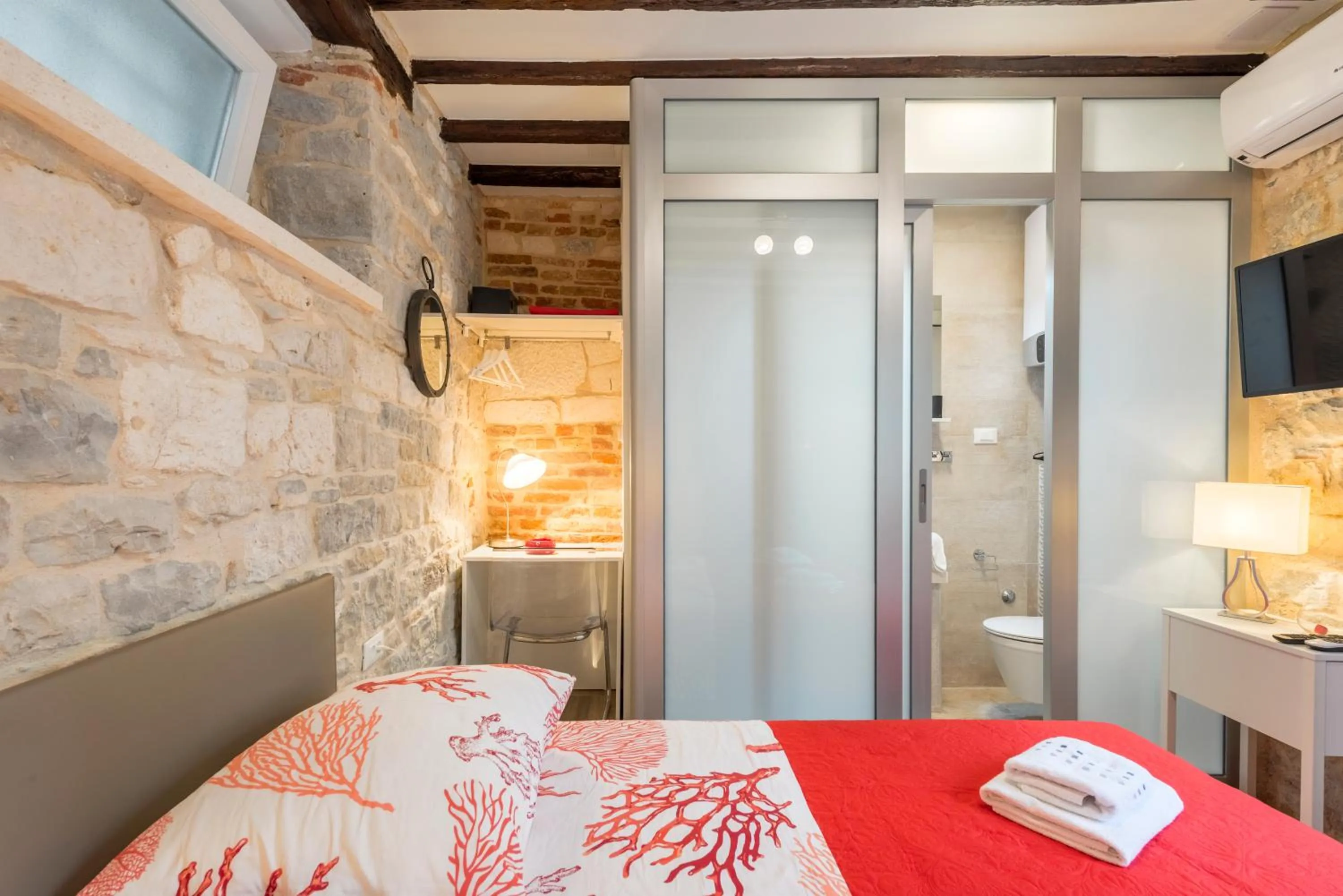 Bathroom, Bed in Apartments & Rooms Dujam