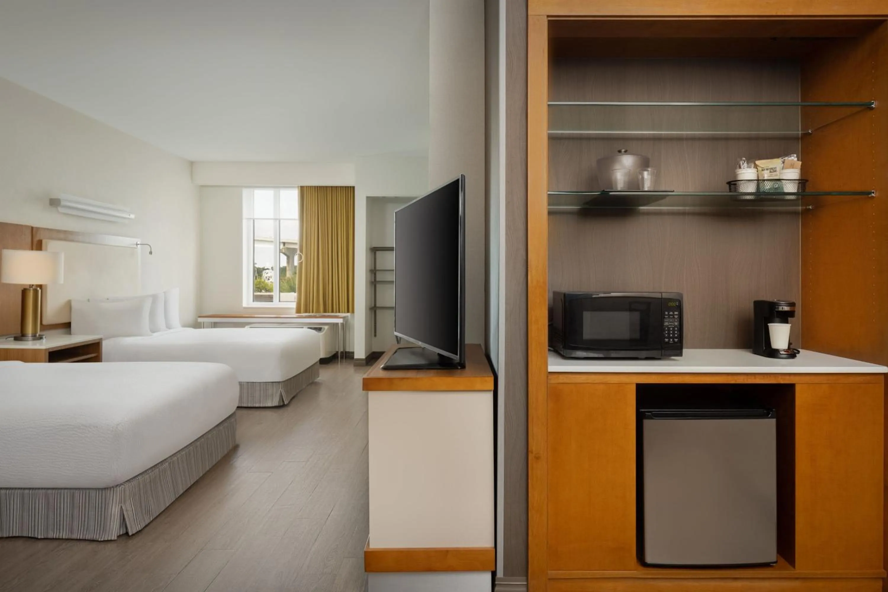 Photo of the whole room, Bed in SpringHill Suites Orange Beach at The Wharf